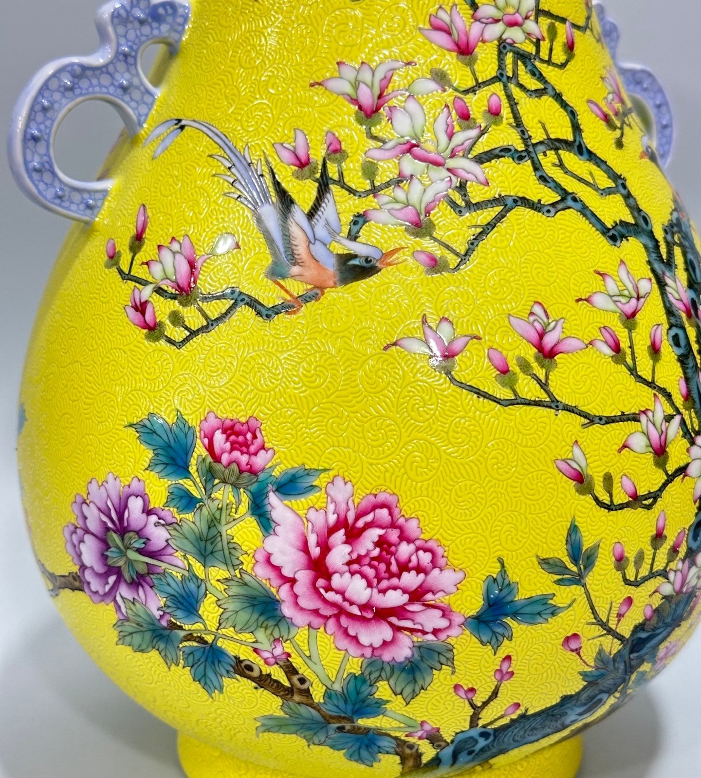 Qing Dynasty Yongzheng Enamel lemon yellow glaze orbital flower and bird poetry double-eared statue