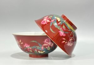 Qing Dynasty Yongzheng Enamel coral red orchid pattern bowl