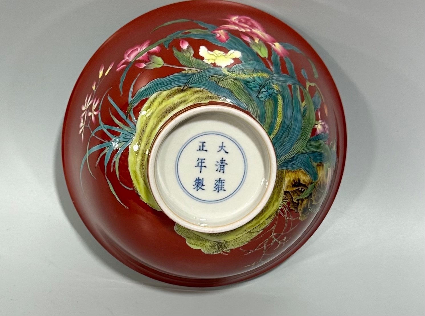 Qing Dynasty Yongzheng Enamel coral red orchid pattern bowl