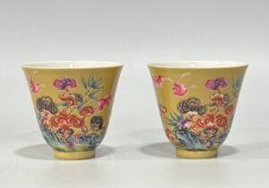 Qing Dynasty Yongzheng Enamel beige glaze cup with auspicious patterns