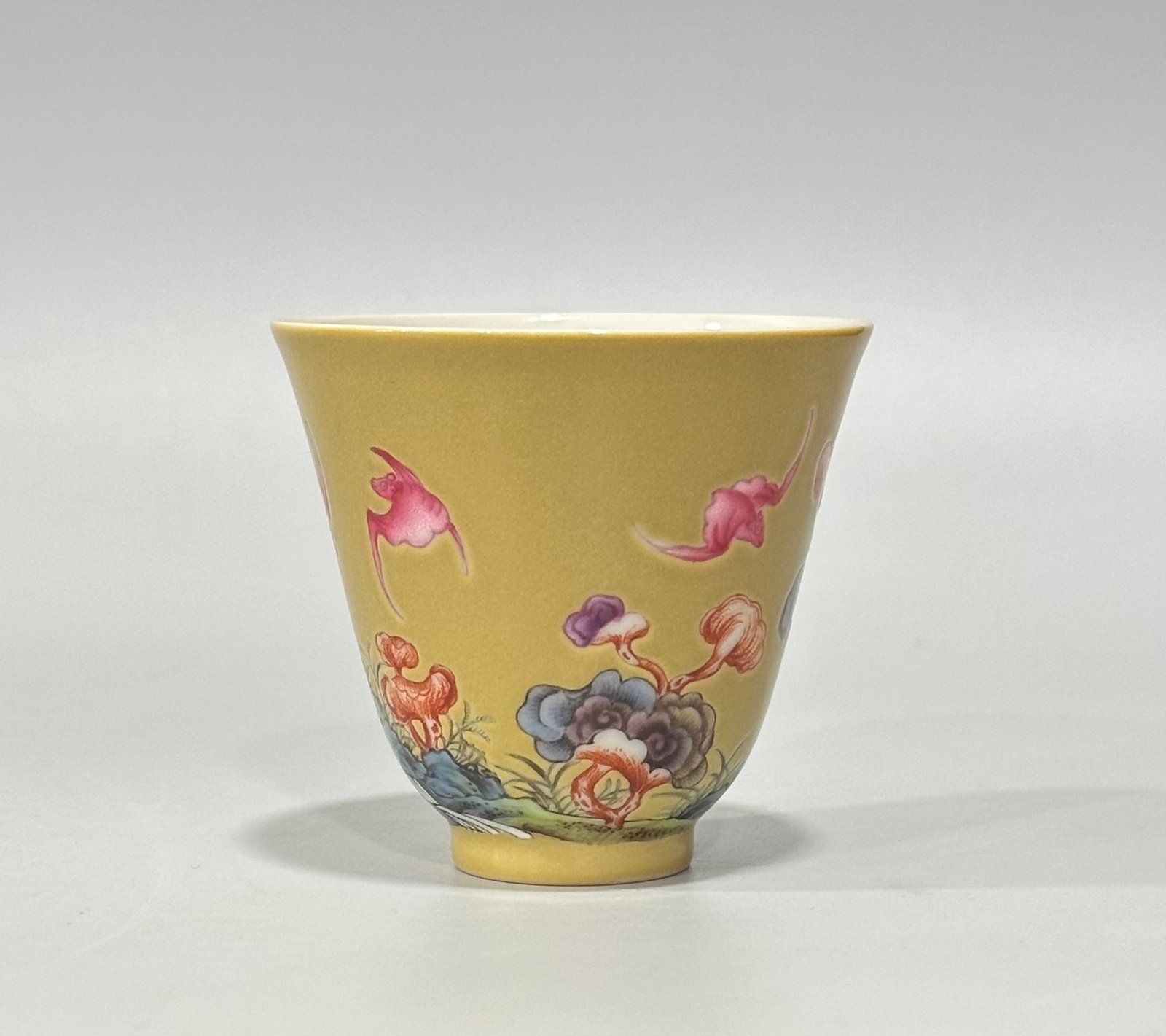 Qing Dynasty Yongzheng Enamel beige glaze cup with auspicious patterns