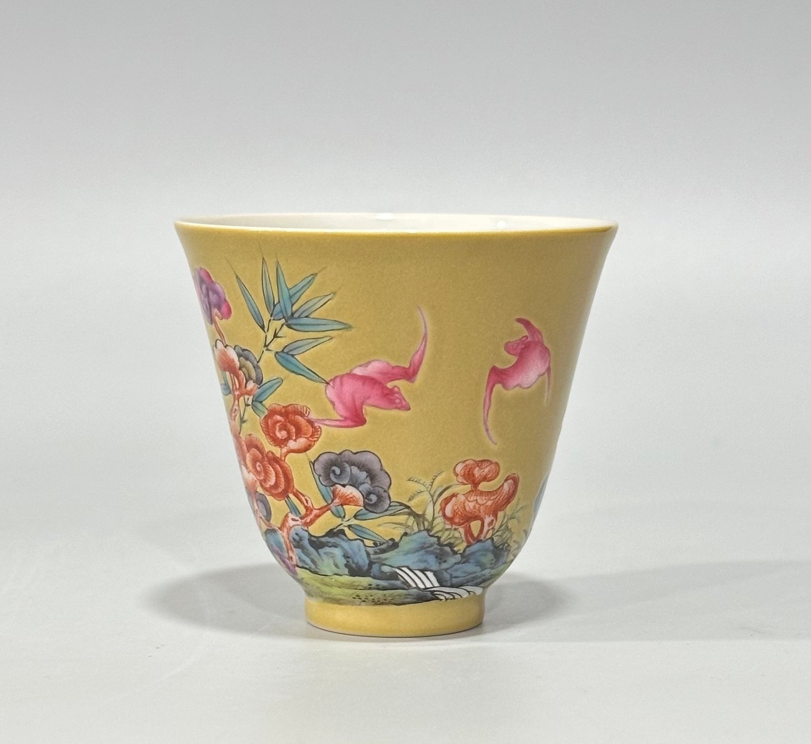 Qing Dynasty Yongzheng Enamel beige glaze cup with auspicious patterns