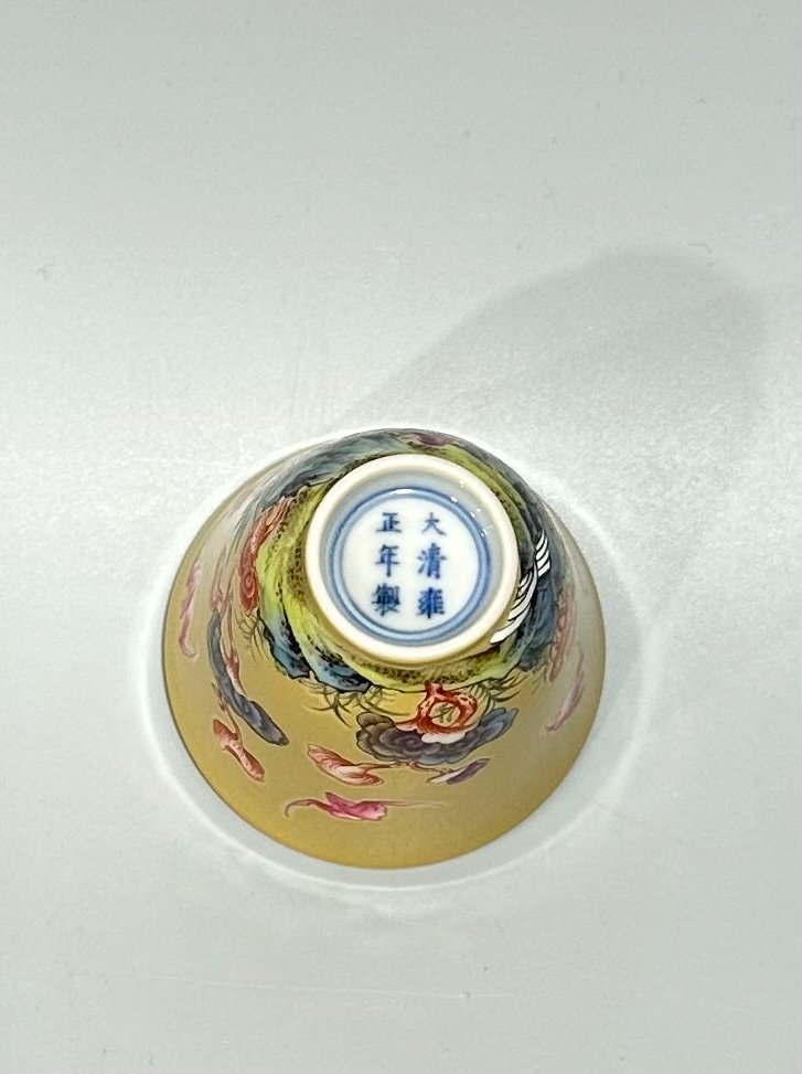 Qing Dynasty Yongzheng Enamel beige glaze cup with auspicious patterns