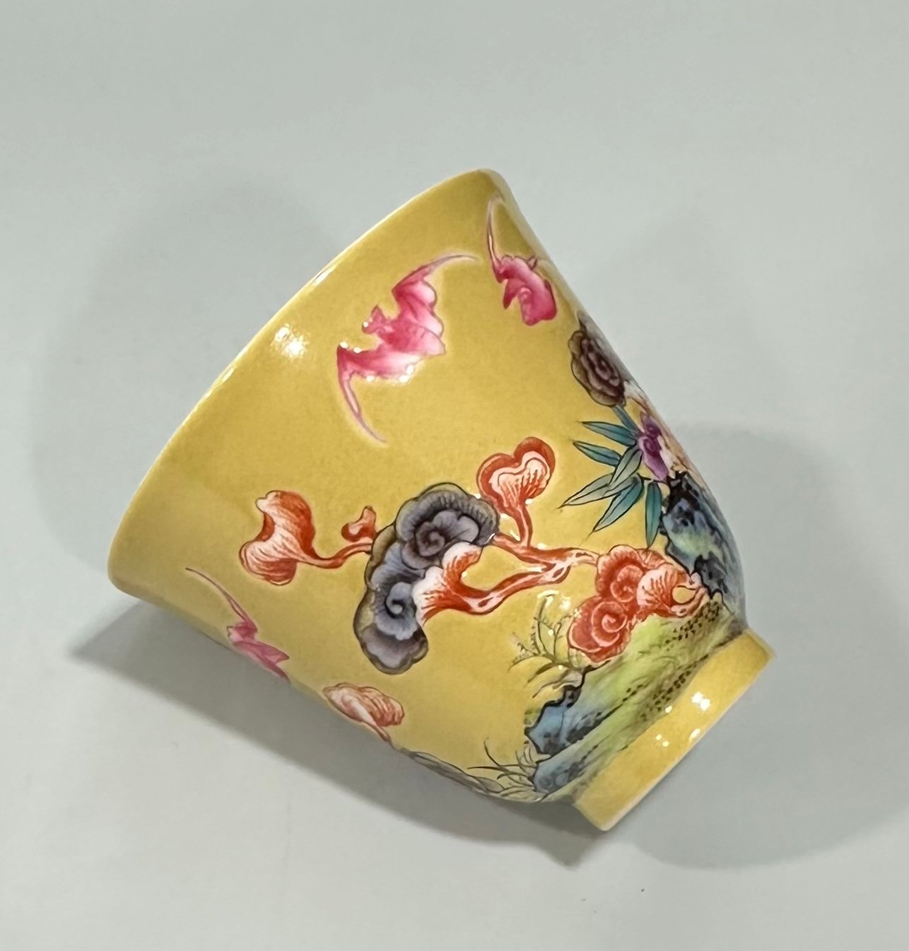 Qing Dynasty Yongzheng Enamel beige glaze cup with auspicious patterns
