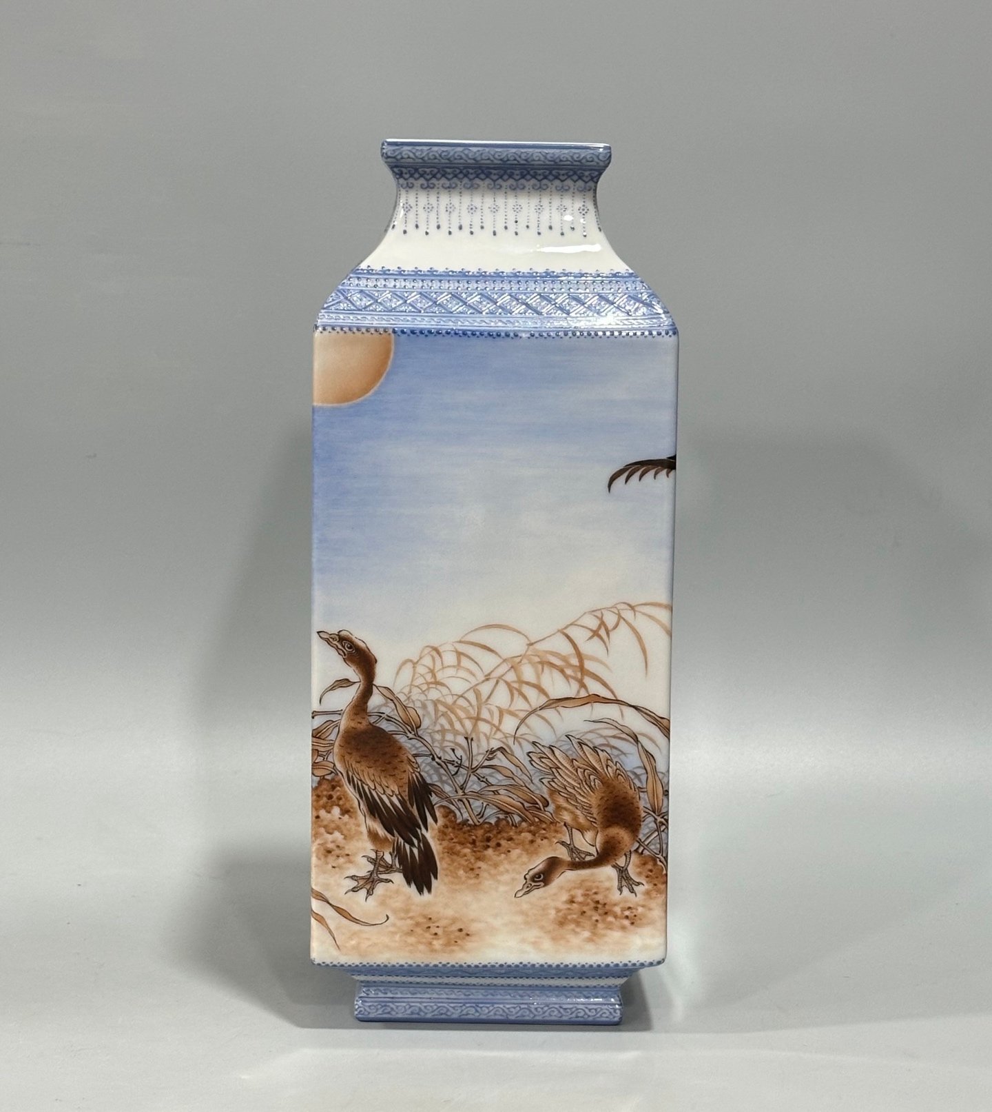 Qing Dynasty Yongzheng Enamel square vase with green edging and reed
