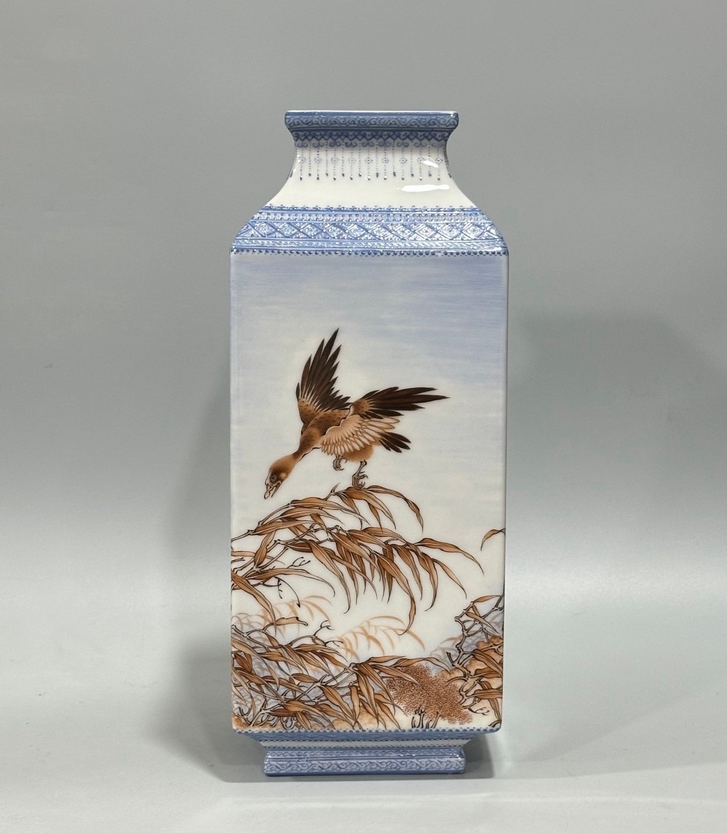 Qing Dynasty Yongzheng Enamel square vase with green edging and reed
