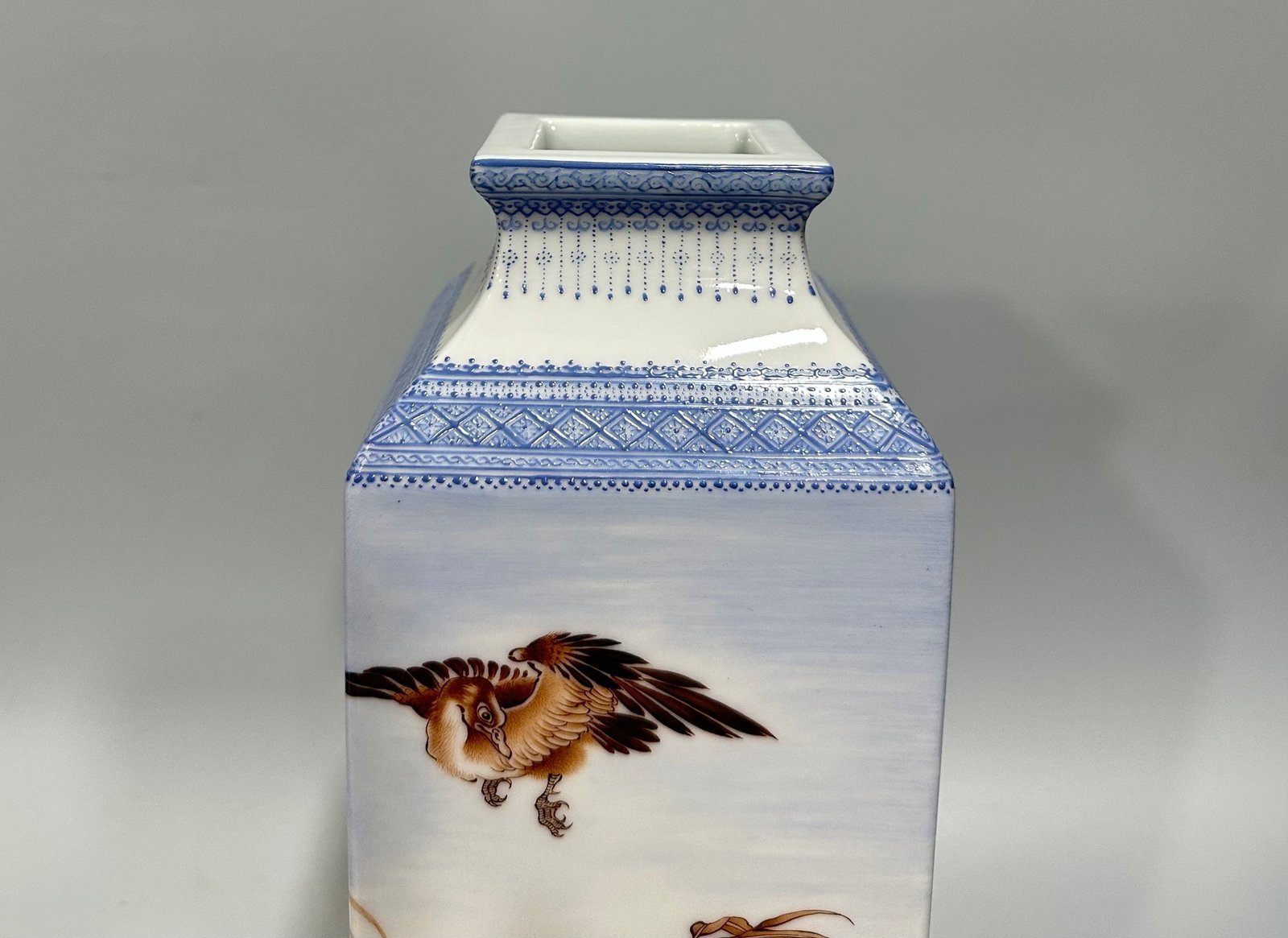 Qing Dynasty Yongzheng Enamel square vase with green edging and reed