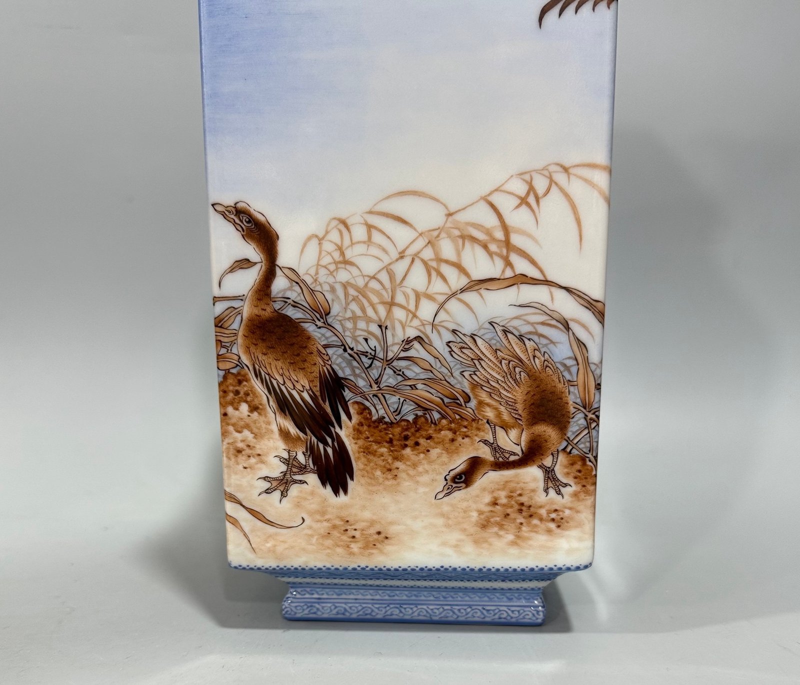 Qing Dynasty Yongzheng Enamel square vase with green edging and reed