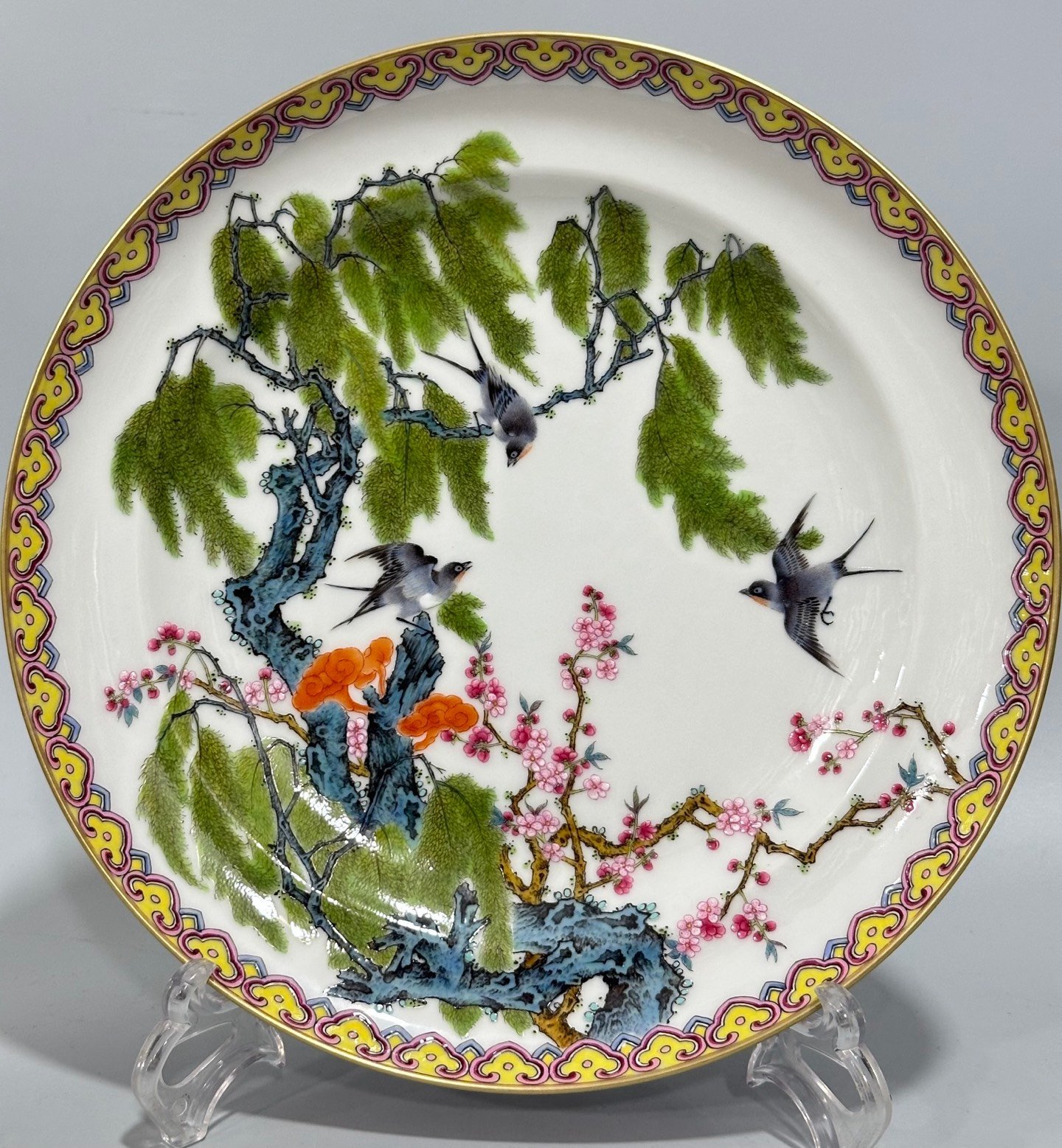 Qing Dynasty Yongzheng Enamel and rouge red plate with flowers birds willows and swallows on the inside