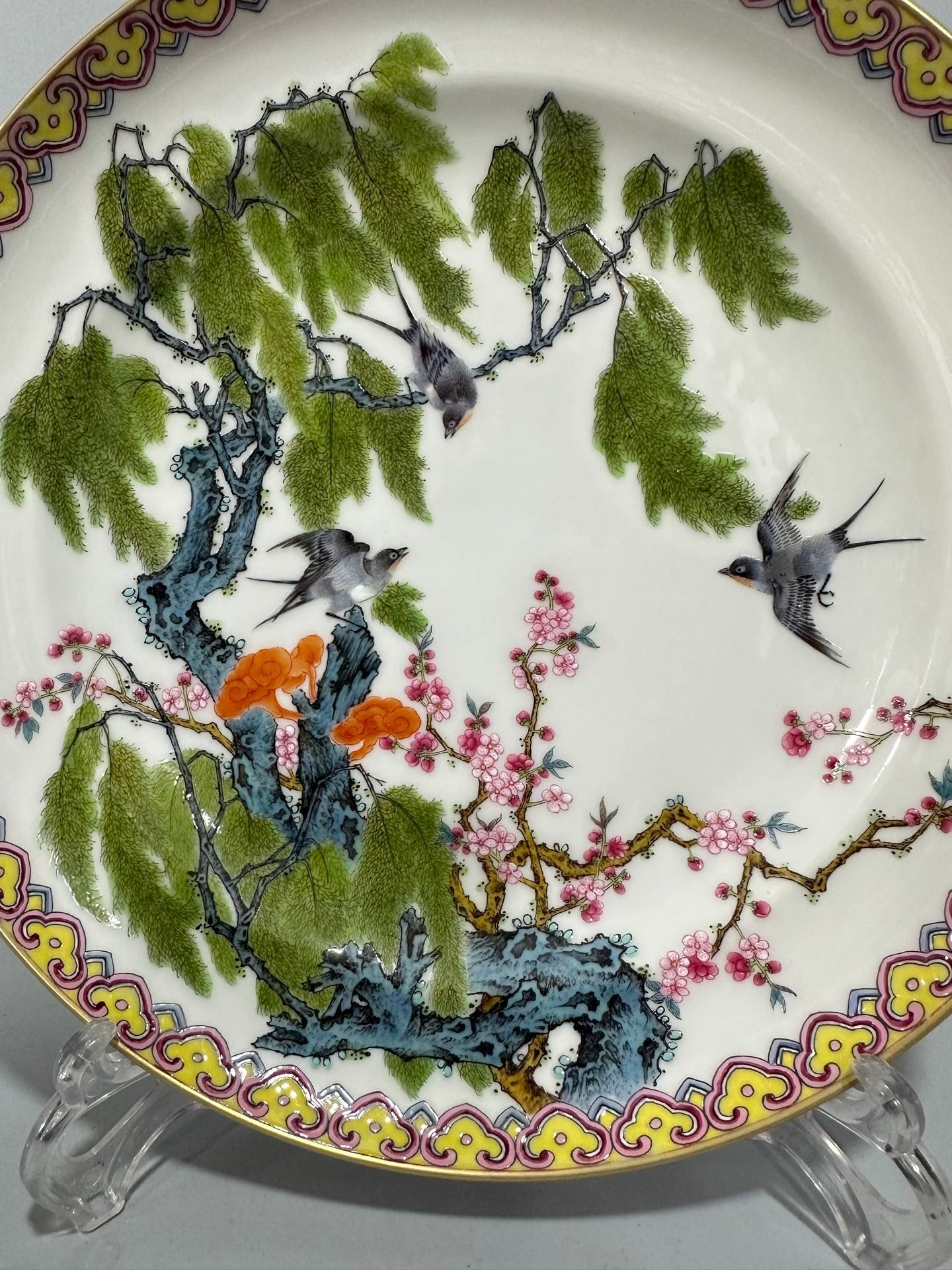 Qing Dynasty Yongzheng Enamel and rouge red plate with flowers birds willows and swallows on the inside