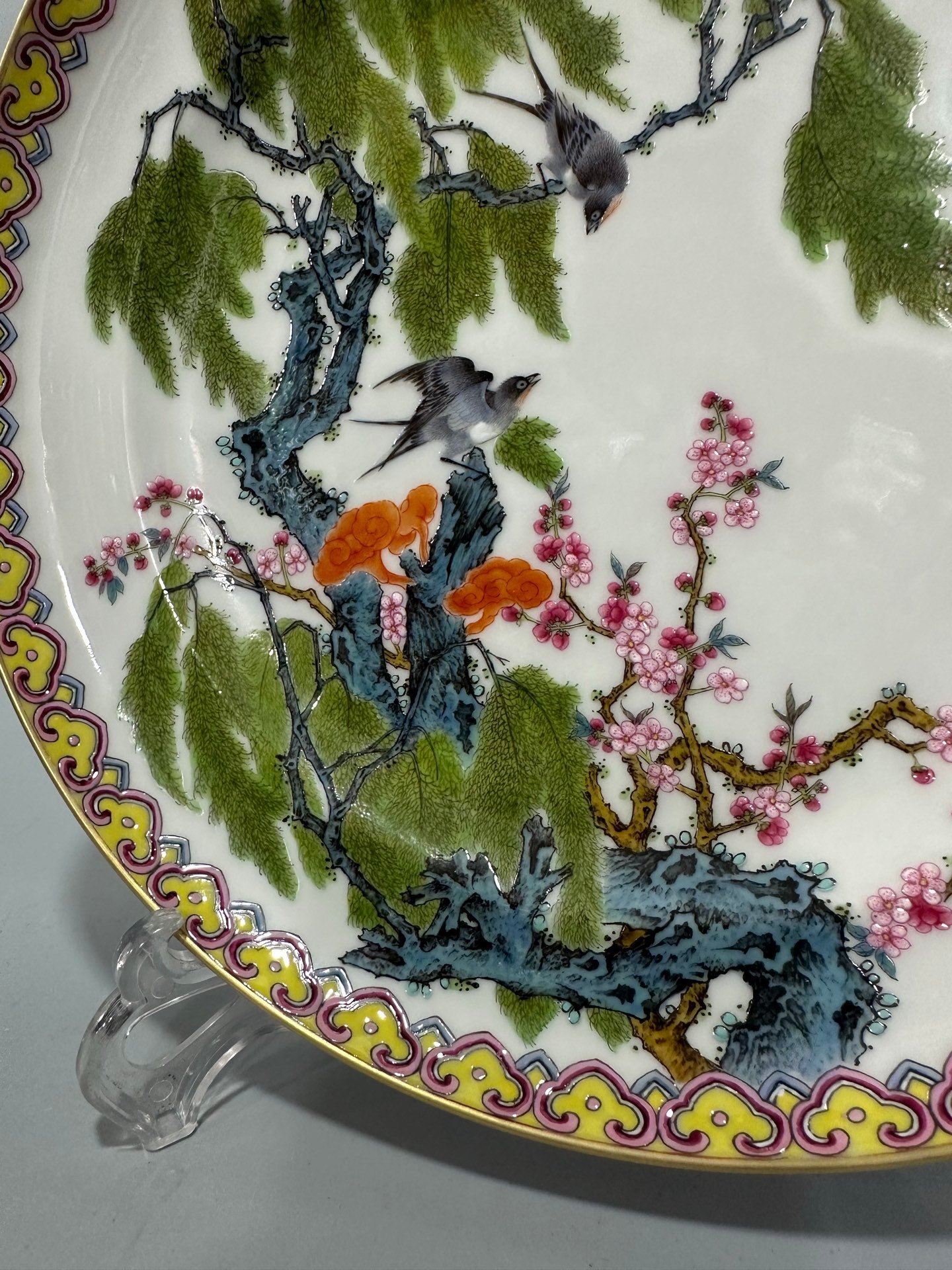 Qing Dynasty Yongzheng Enamel and rouge red plate with flowers birds willows and swallows on the inside