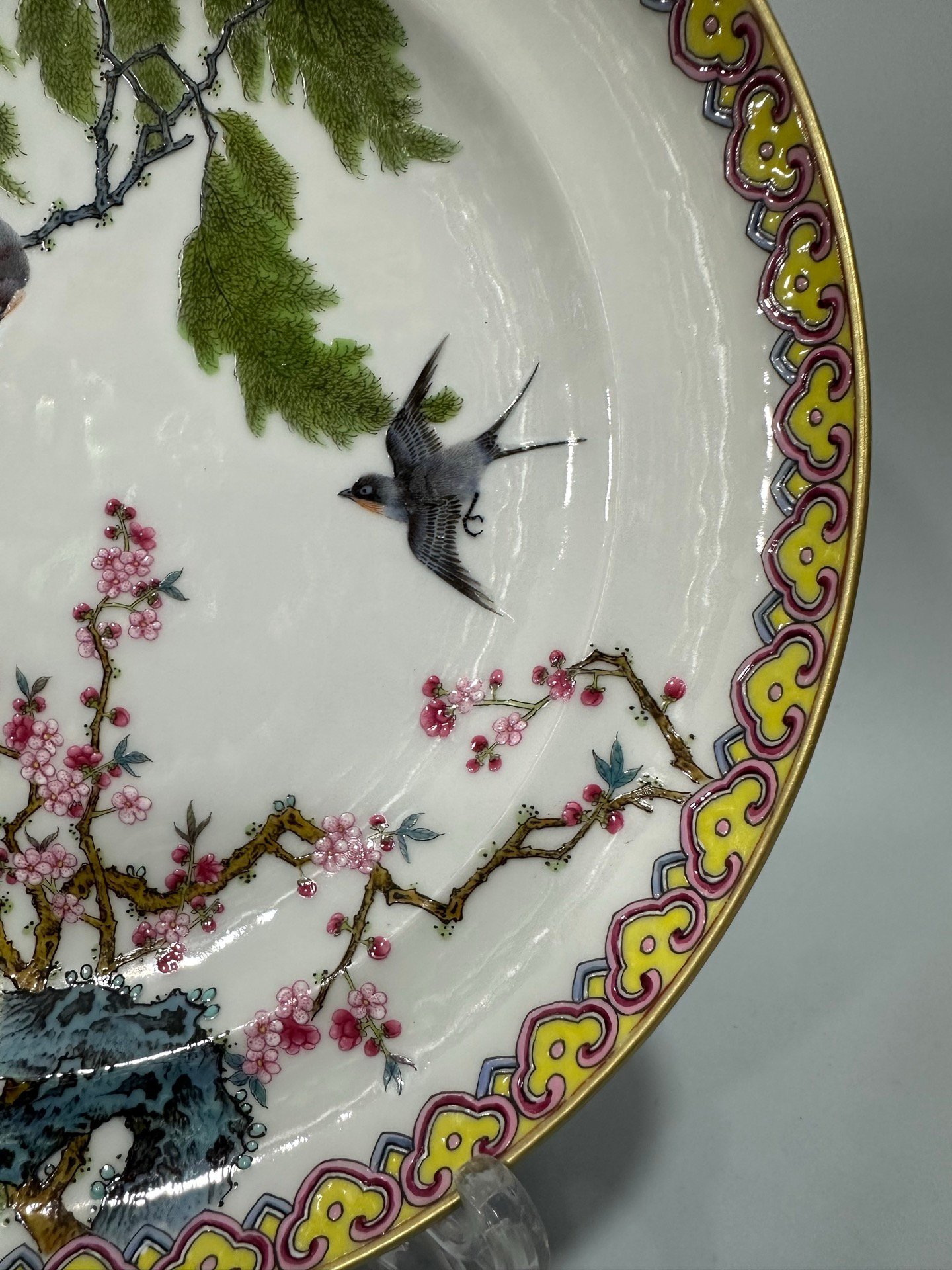 Qing Dynasty Yongzheng Enamel and rouge red plate with flowers birds willows and swallows on the inside