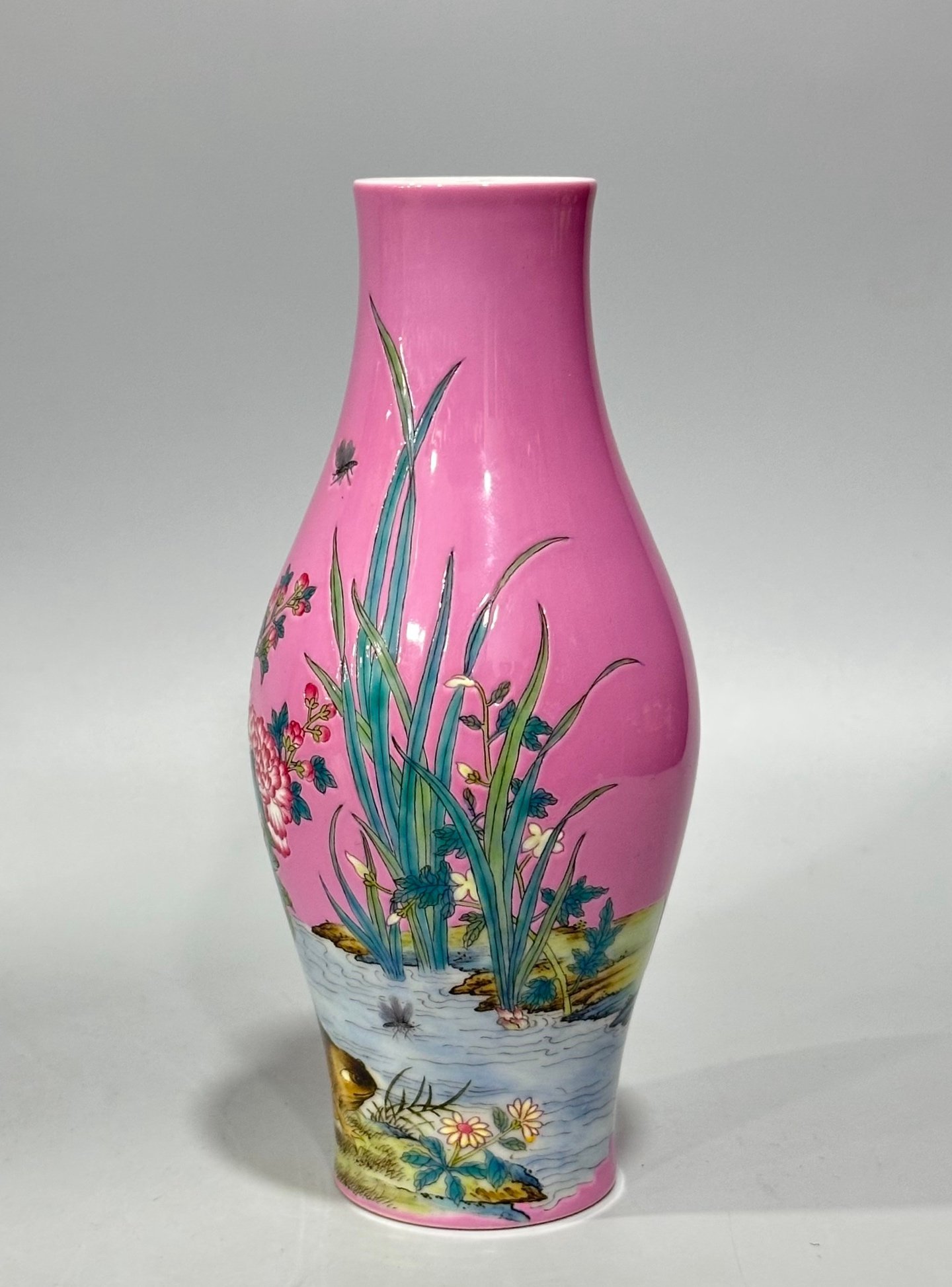 Qing Dynasty Yongzheng Enamel rouge red olive vase with floral and insect patterns