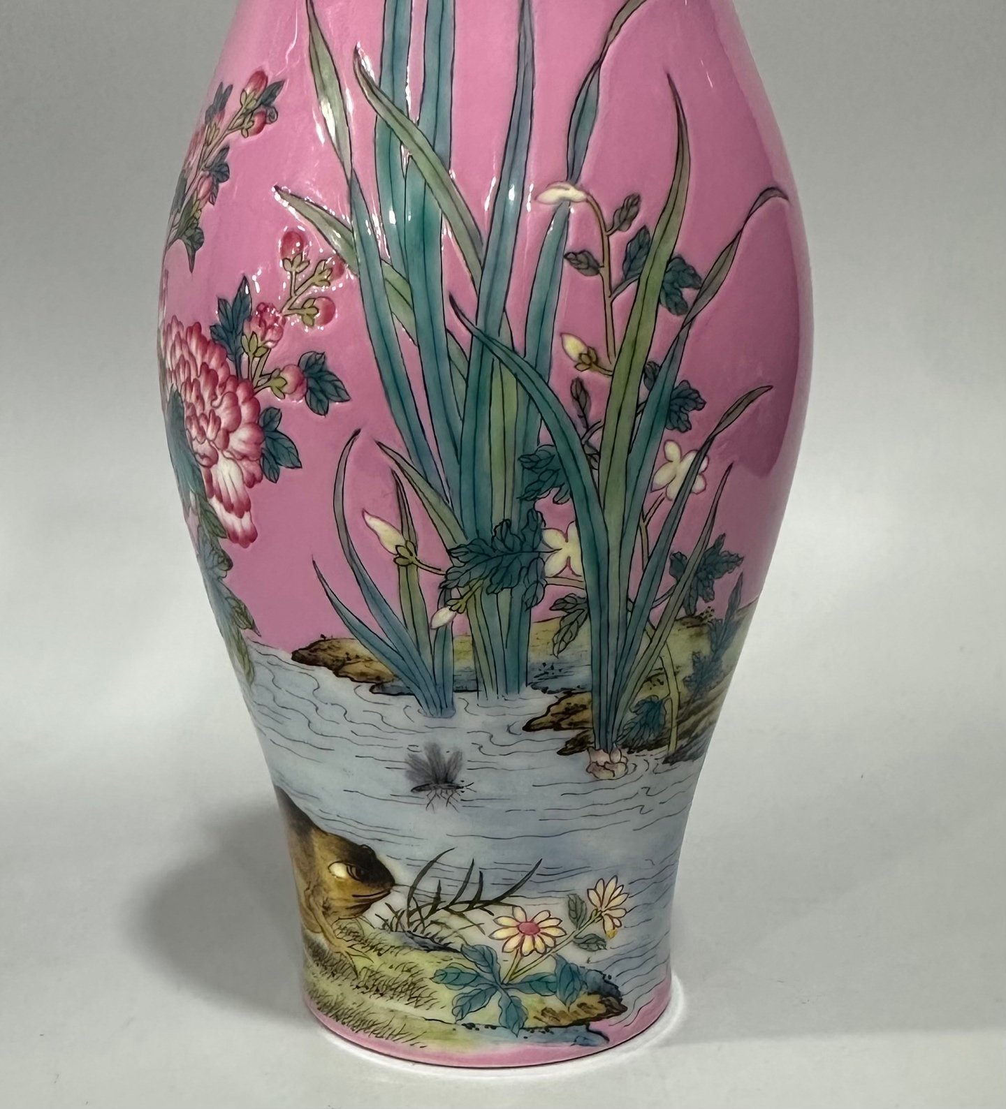 Qing Dynasty Yongzheng Enamel rouge red olive vase with floral and insect patterns
