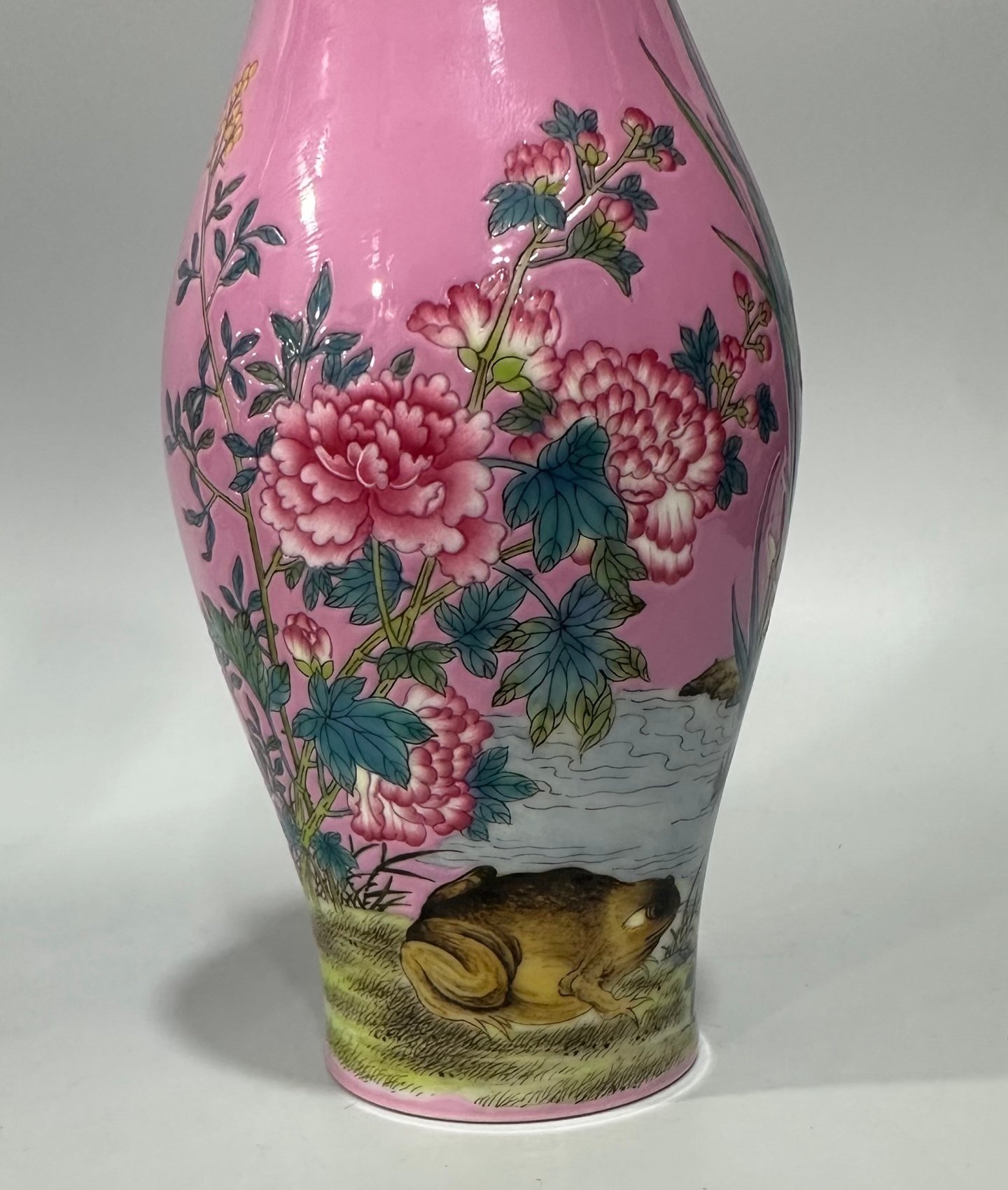 Qing Dynasty Yongzheng Enamel rouge red olive vase with floral and insect patterns