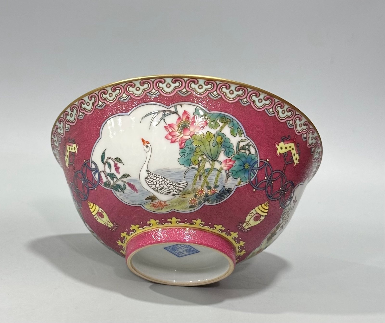 Qing Dynasty Yongzheng Enamel and rouge red orbital windowed bowl with flower and bird