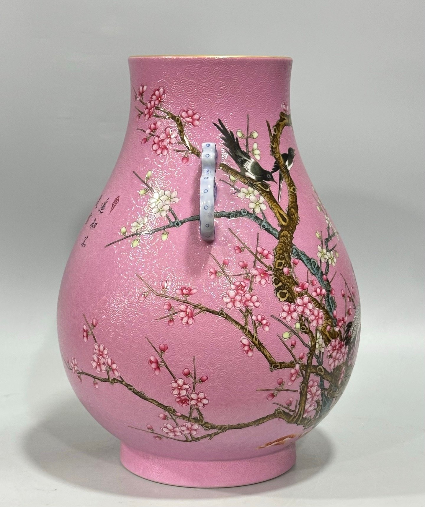 Qing Dynasty Yongzheng Enamel and rouge red track flower and bird poems and two-eared statue