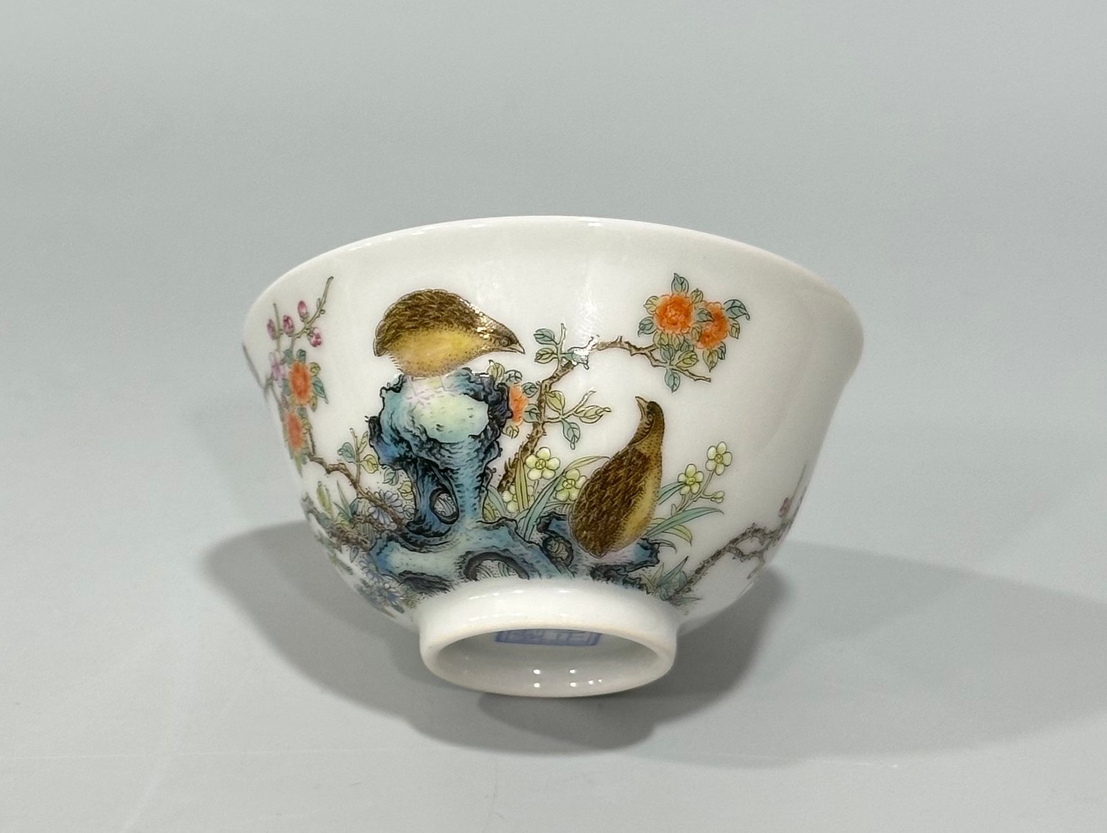 Qing Dynasty Yongzheng Enamel cup with patterns of flowers and birds living and working in peace