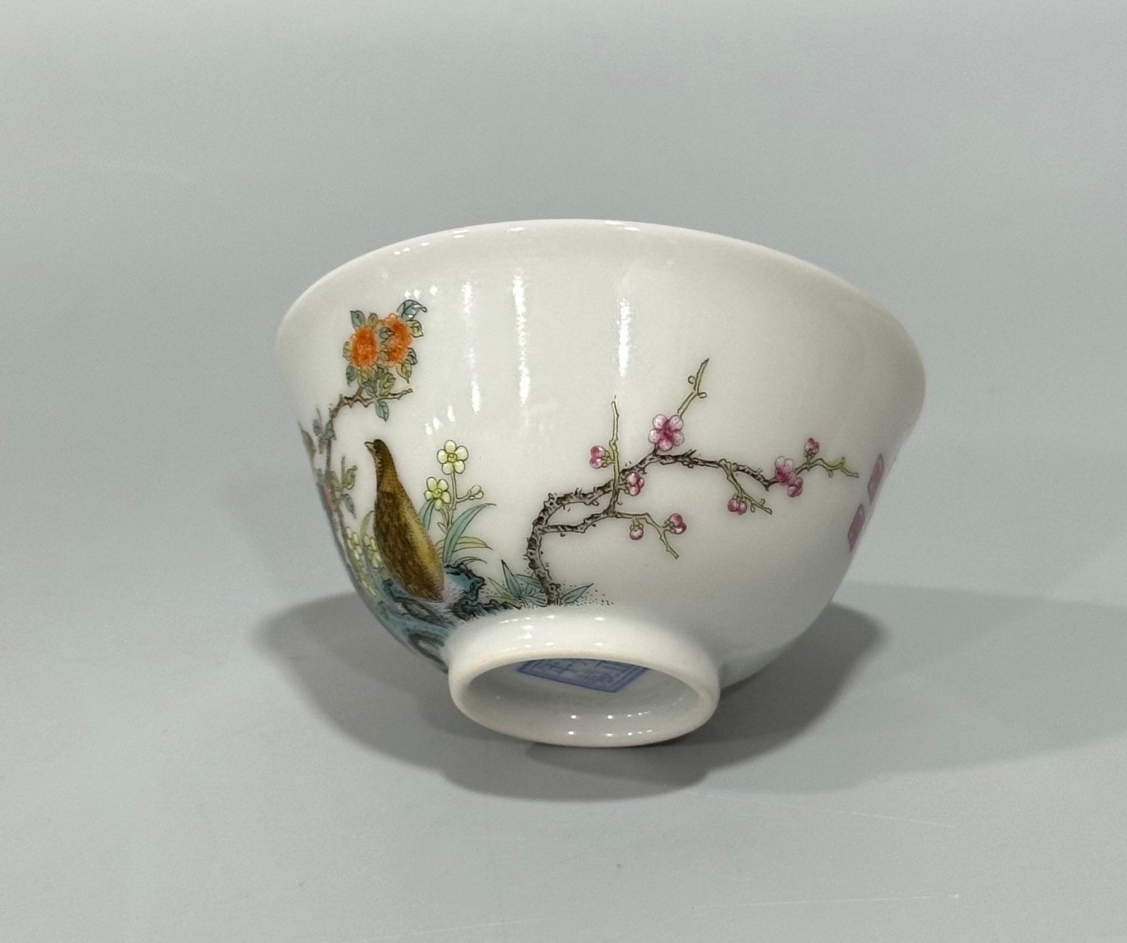 Qing Dynasty Yongzheng Enamel cup with patterns of flowers and birds living and working in peace