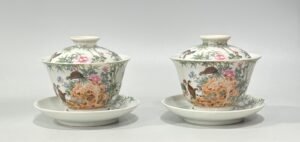 Qing Dynasty Yongzheng Enamel three-cai covered bowl with flowers and birds poems and essays