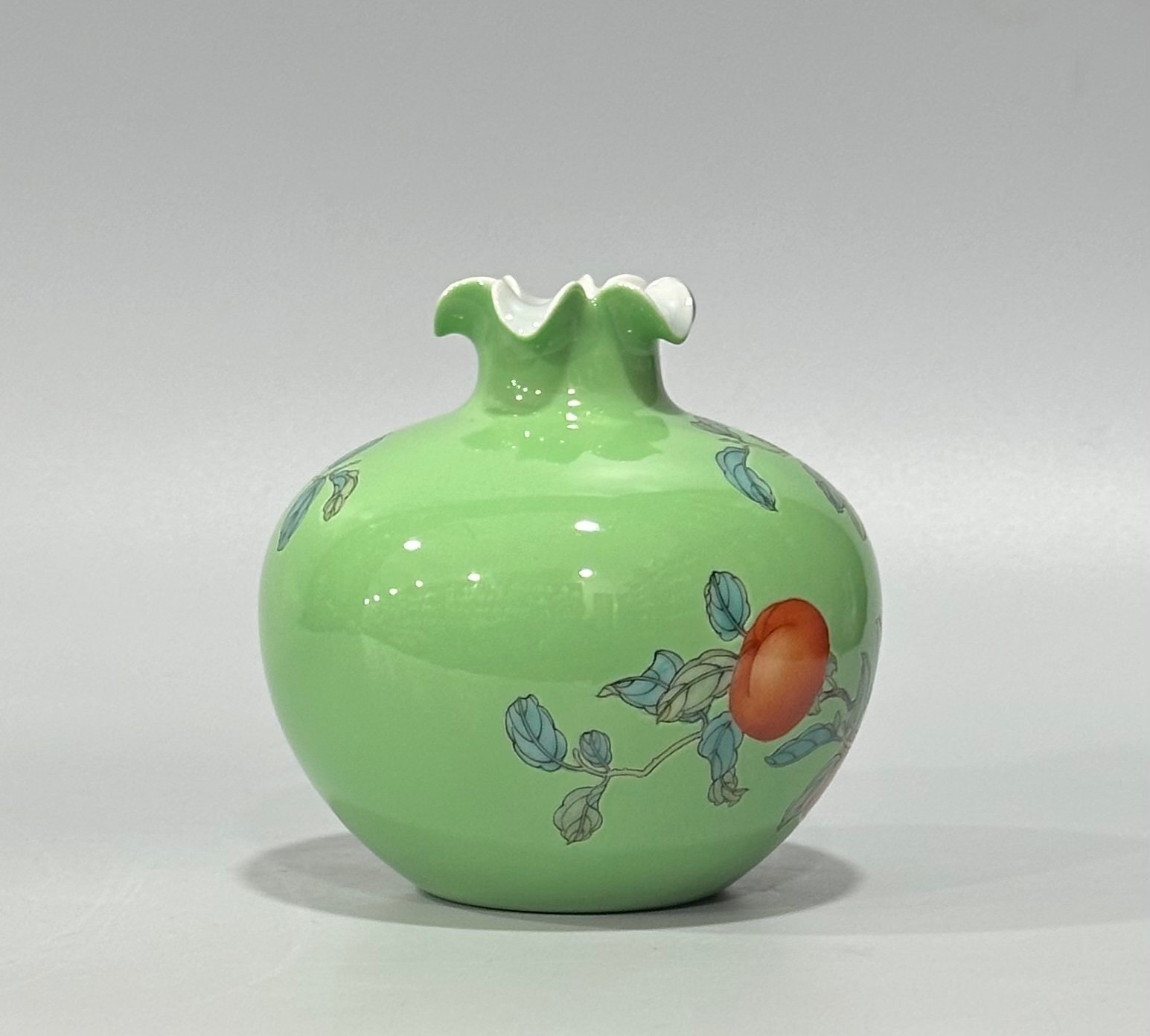 Qing Dynasty Yongzheng Enamel apple green glaze pomegranate statue with everything goes well pattern