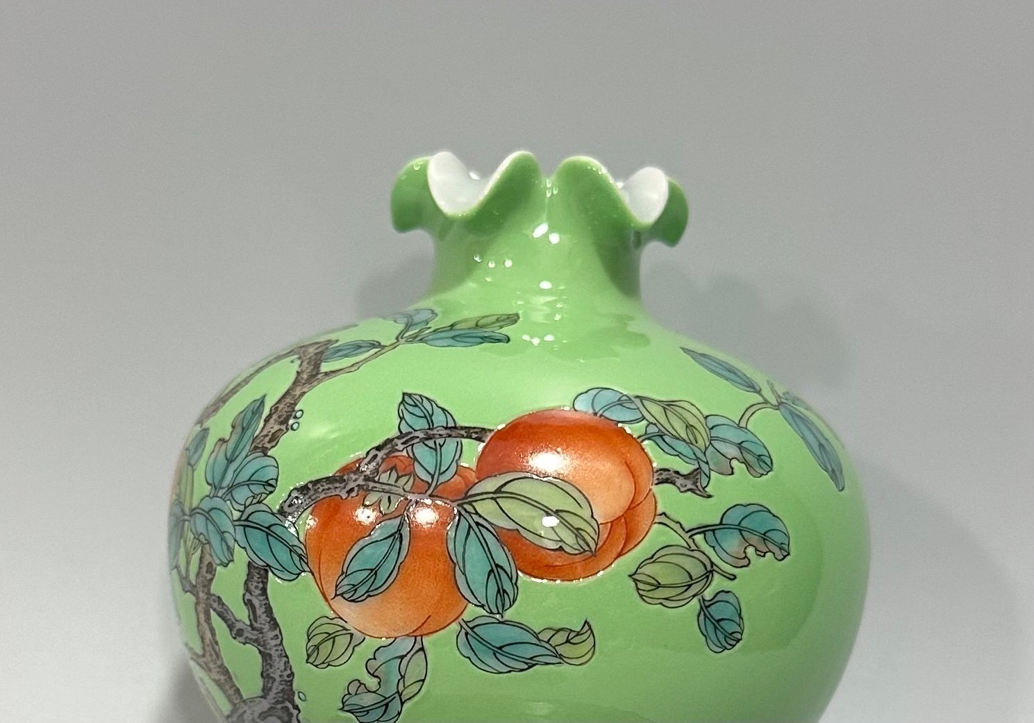 Qing Dynasty Yongzheng Enamel apple green glaze pomegranate statue with everything goes well pattern