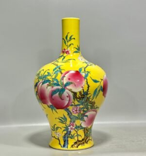 Qing Dynasty Yongzheng Enamel vase with eight peach patterns on yellow ground