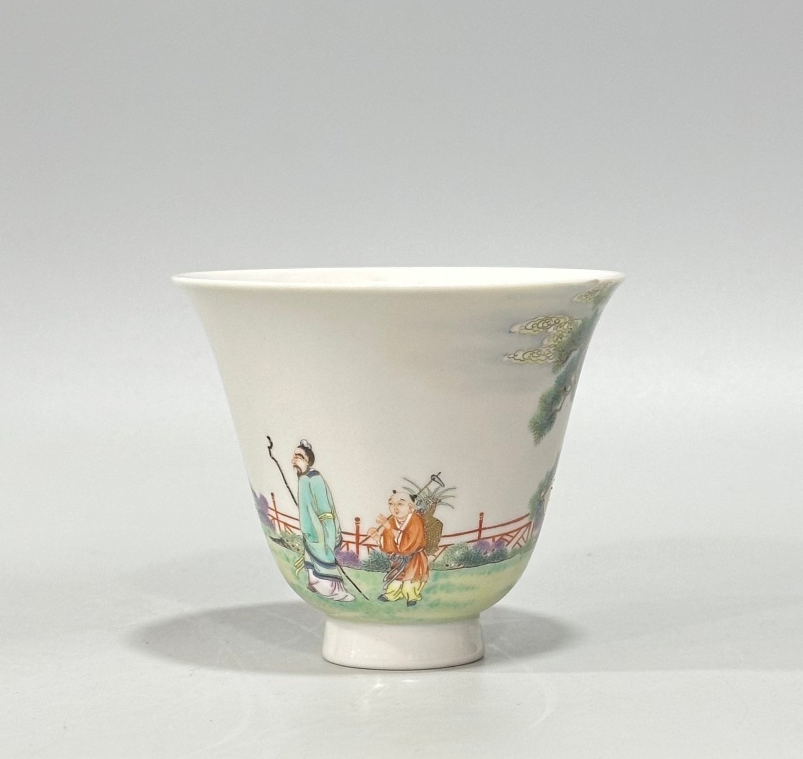 Qing Dynasty Yongzheng a pastel cup with a figure and a scholar