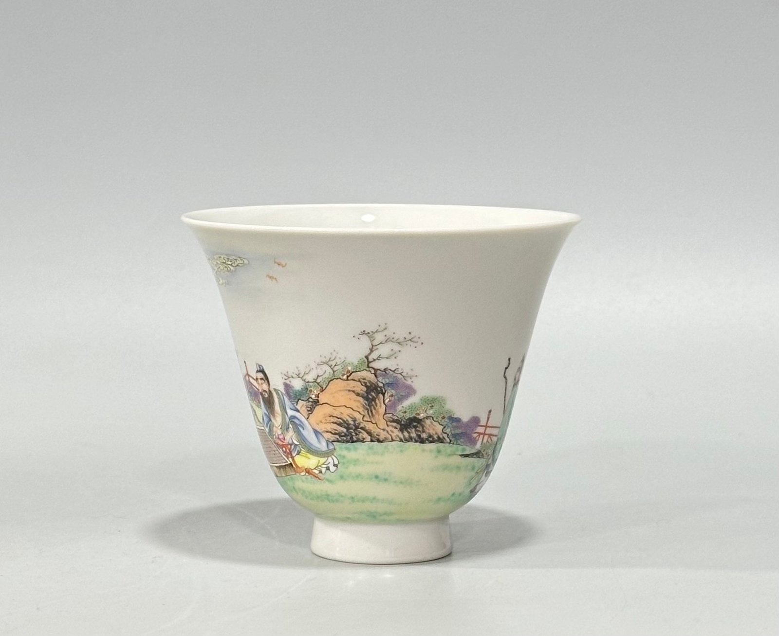 Qing Dynasty Yongzheng a pastel cup with a figure and a scholar