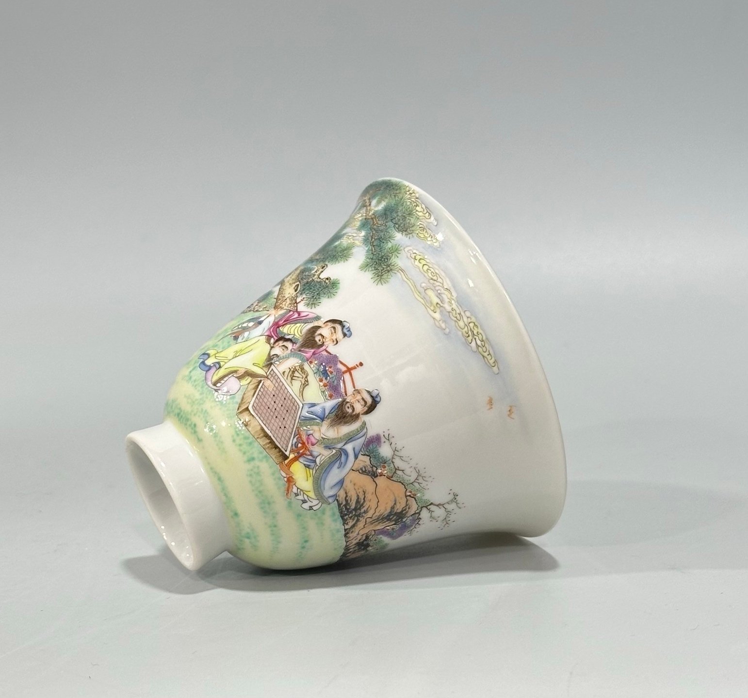 Qing Dynasty Yongzheng a pastel cup with a figure and a scholar