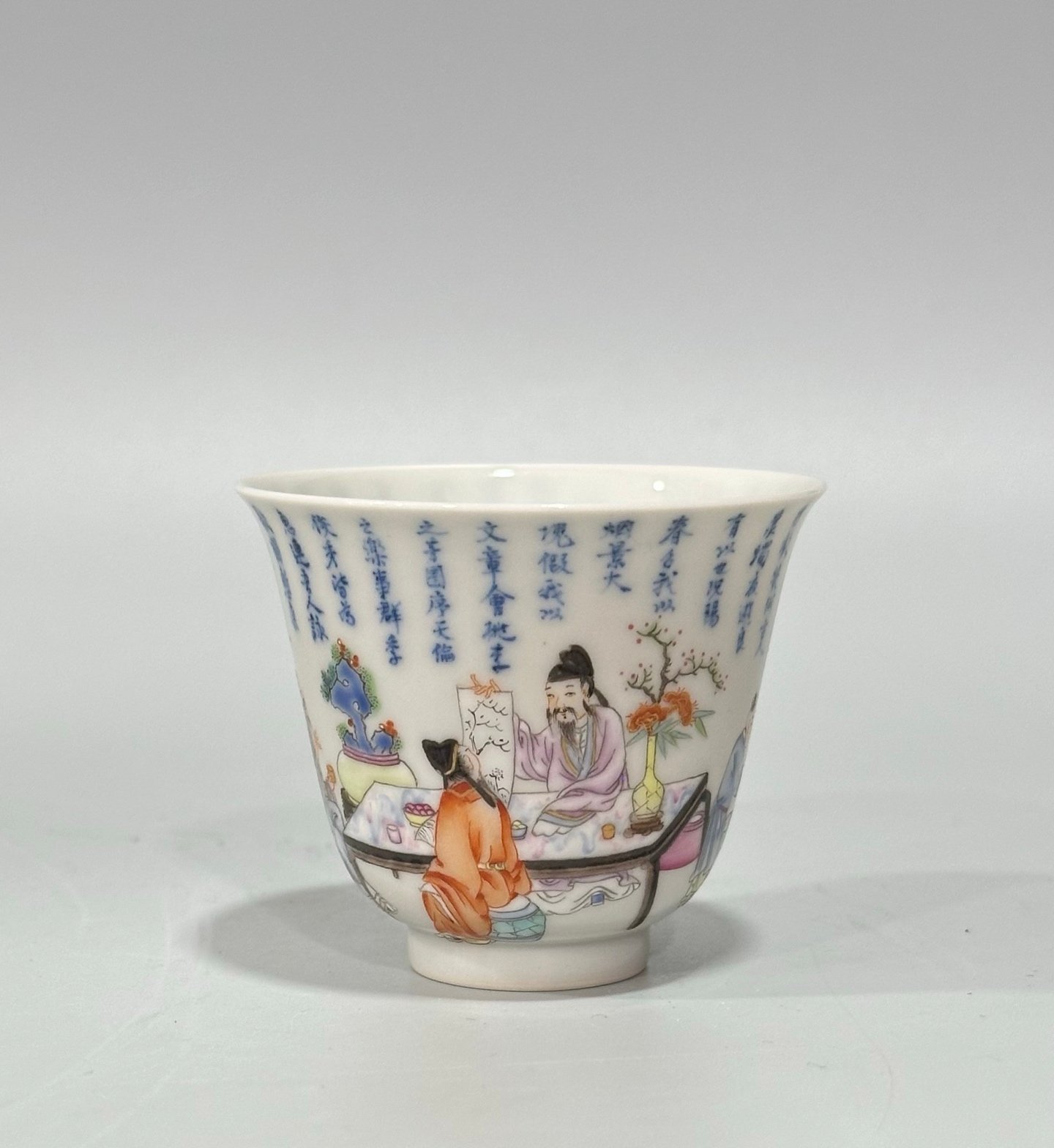 Qing Dynasty Yongzheng Pastel blue and white poetry cup with figures drinking from immortals