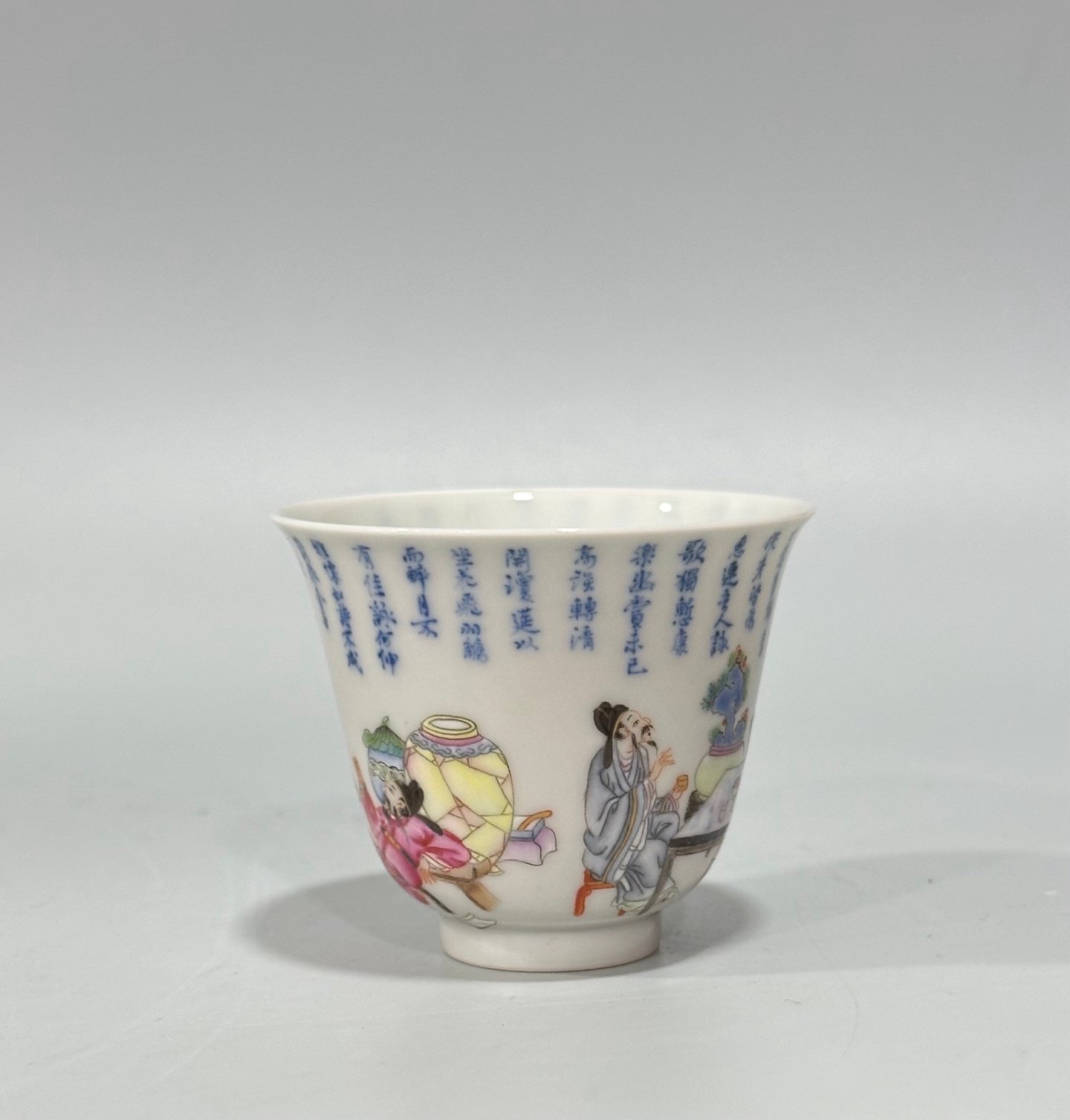Qing Dynasty Yongzheng Pastel blue and white poetry cup with figures drinking from immortals