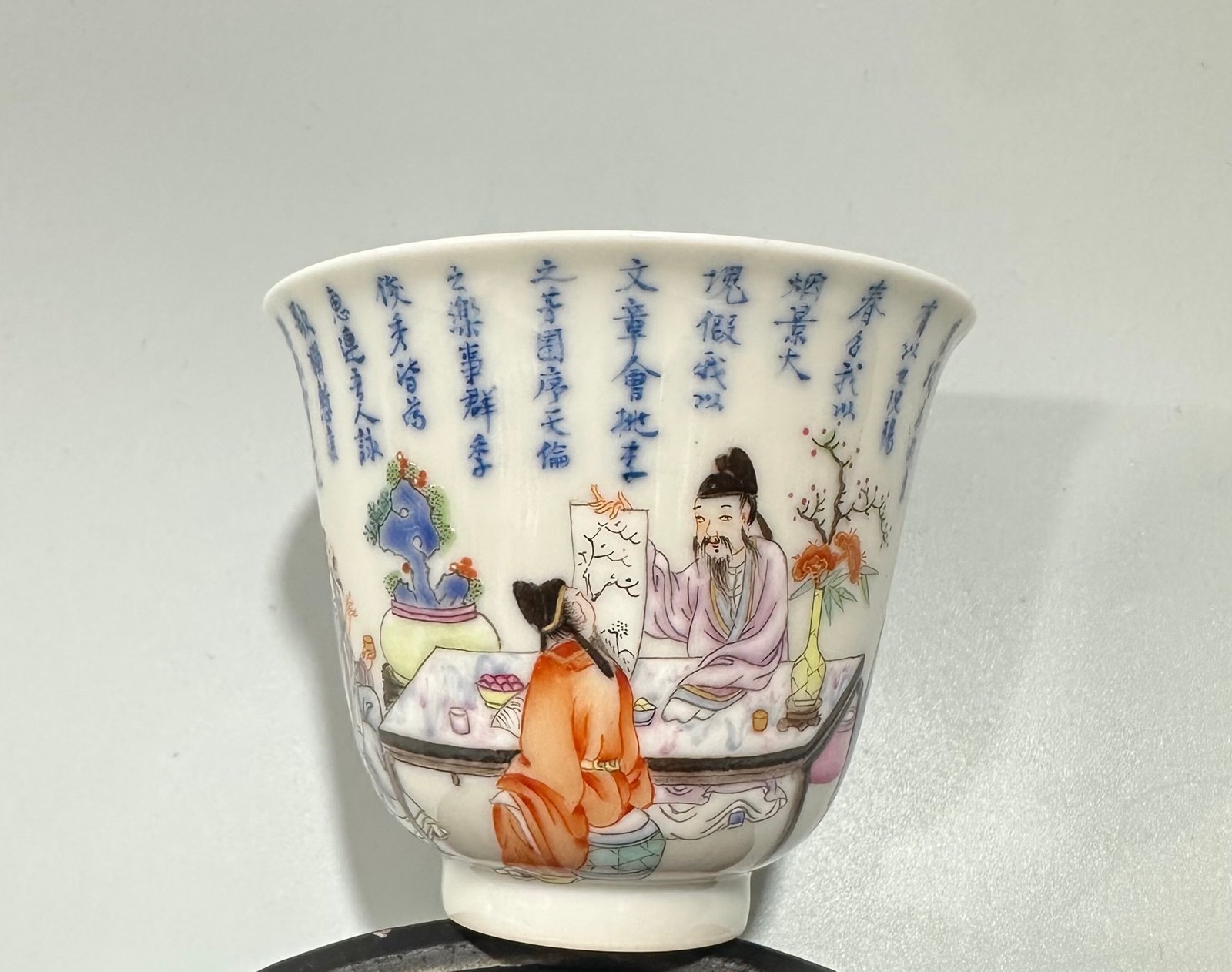 Qing Dynasty Yongzheng Pastel blue and white poetry cup with figures drinking from immortals