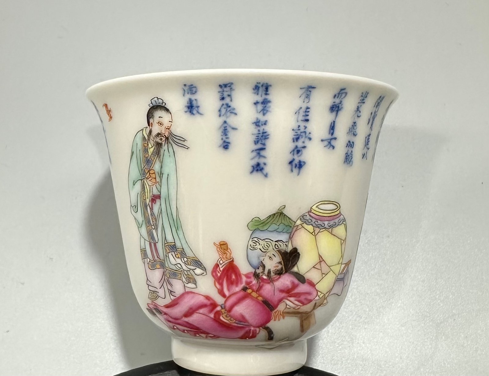 Qing Dynasty Yongzheng Pastel blue and white poetry cup with figures drinking from immortals