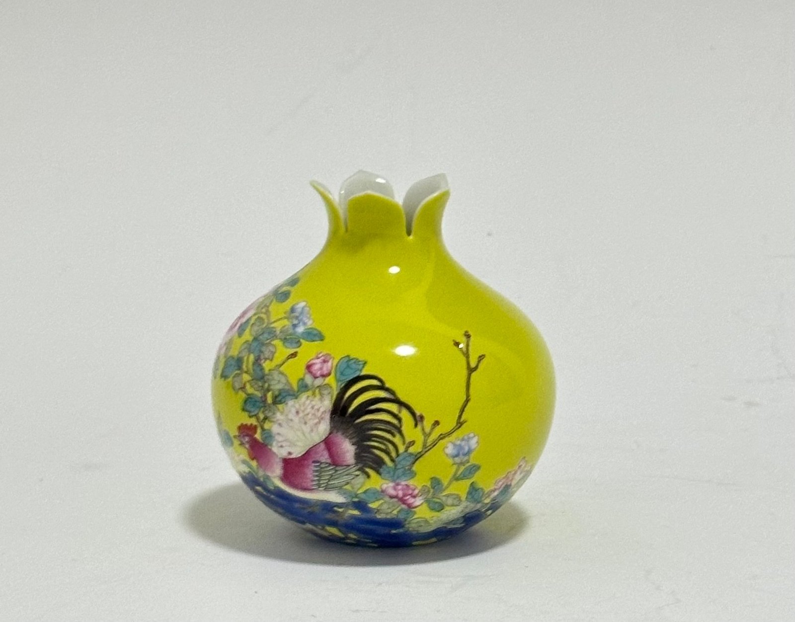 Qing Dynasty Yongzheng Pastel lemon yellow glaze pomegranate statue with flower and bird patterns