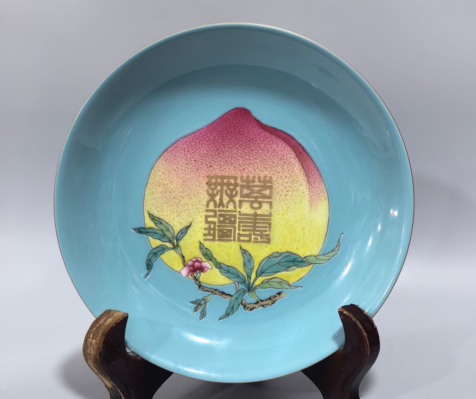 Qing Dynasty Yongzheng Pastel rouge red painted turquoise green peach Wanshou Wujie pattern plate