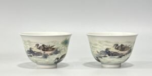 Qing Dynasty Yongzheng pastel reed and wild goose pattern cup