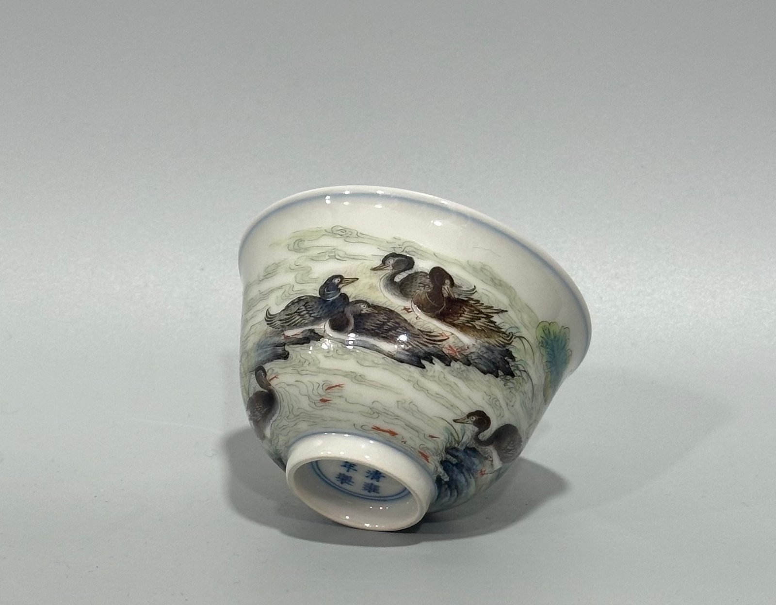 Qing Dynasty Yongzheng pastel reed and wild goose pattern cup