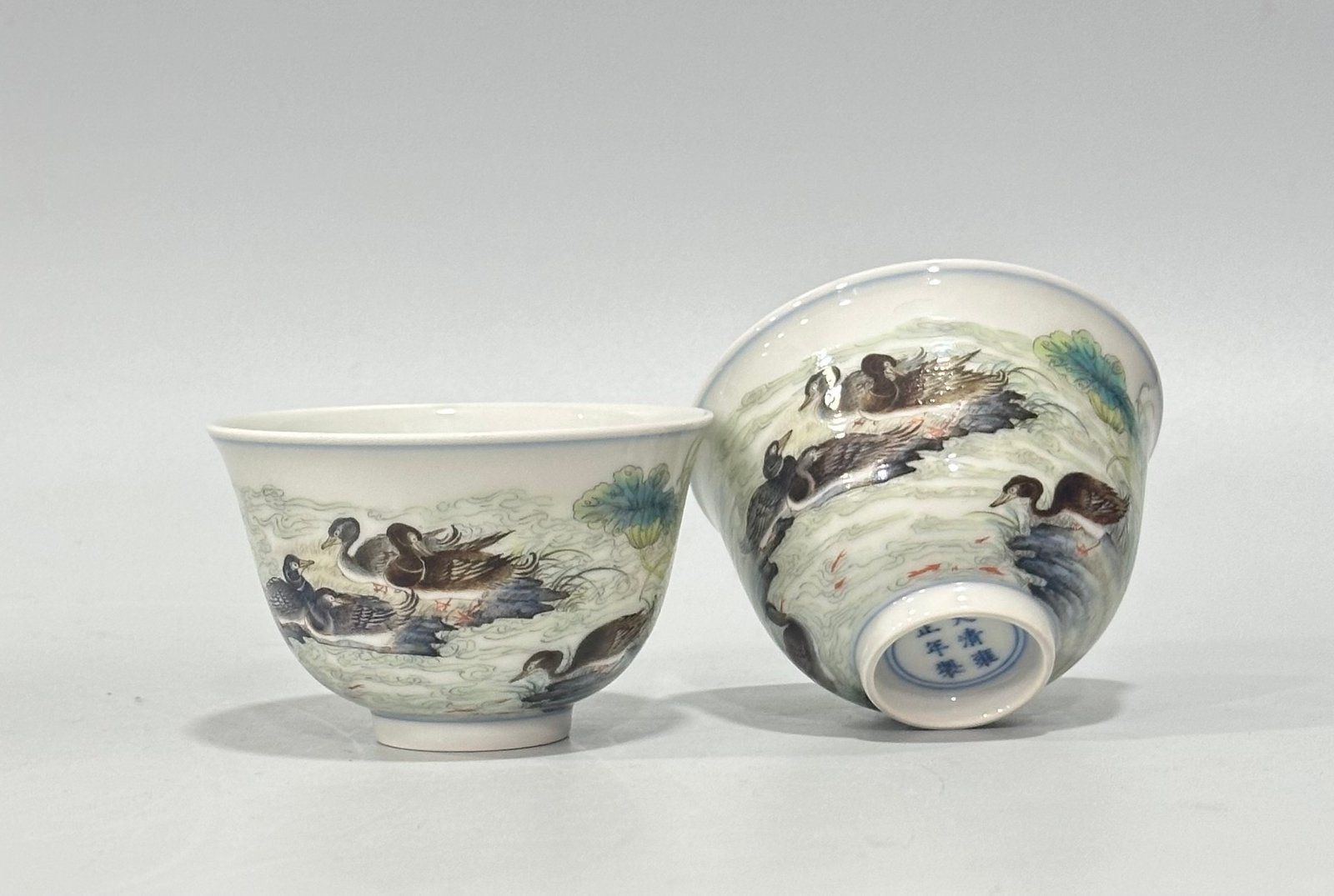 Qing Dynasty Yongzheng pastel reed and wild goose pattern cup