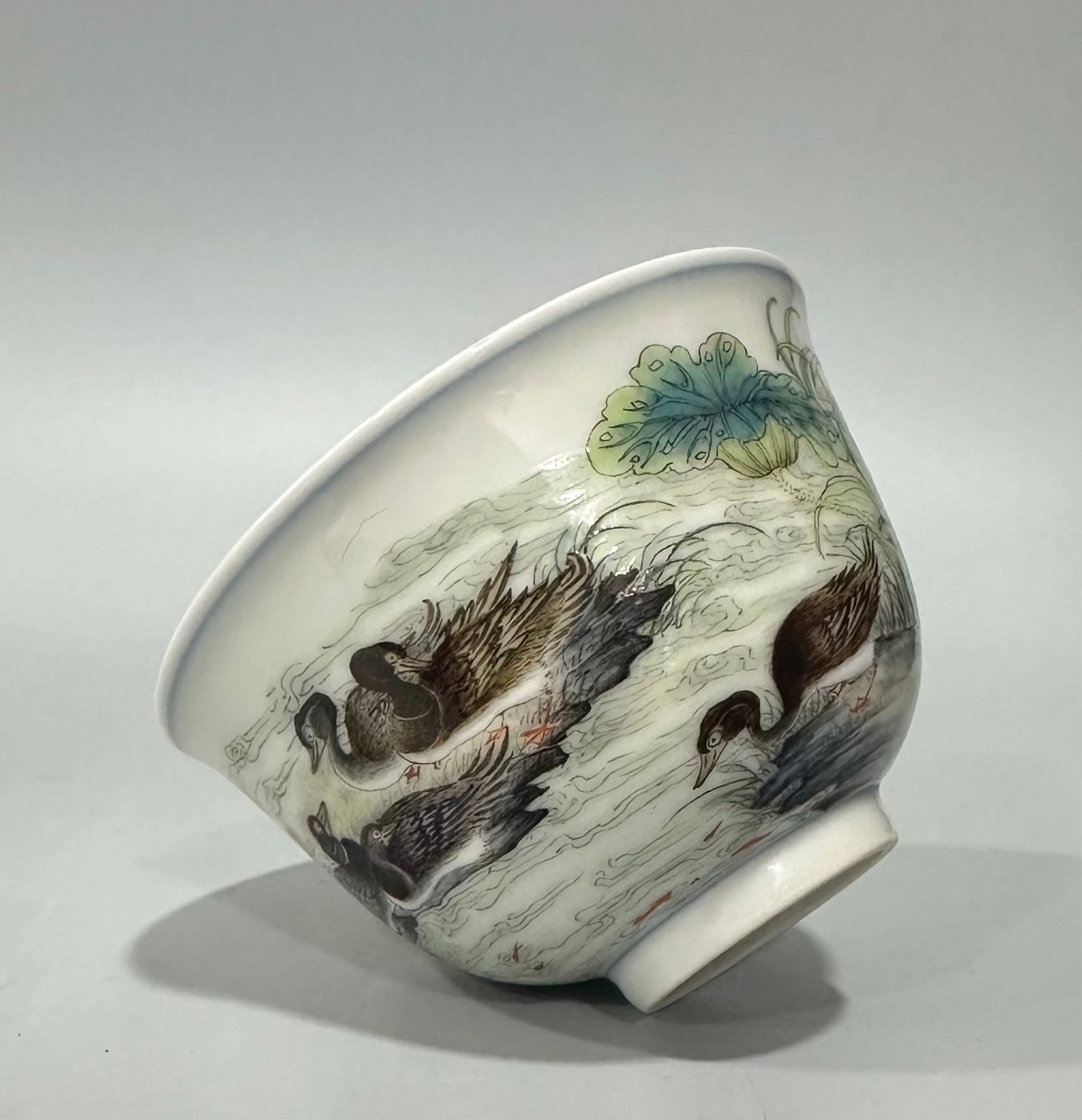 Qing Dynasty Yongzheng pastel reed and wild goose pattern cup
