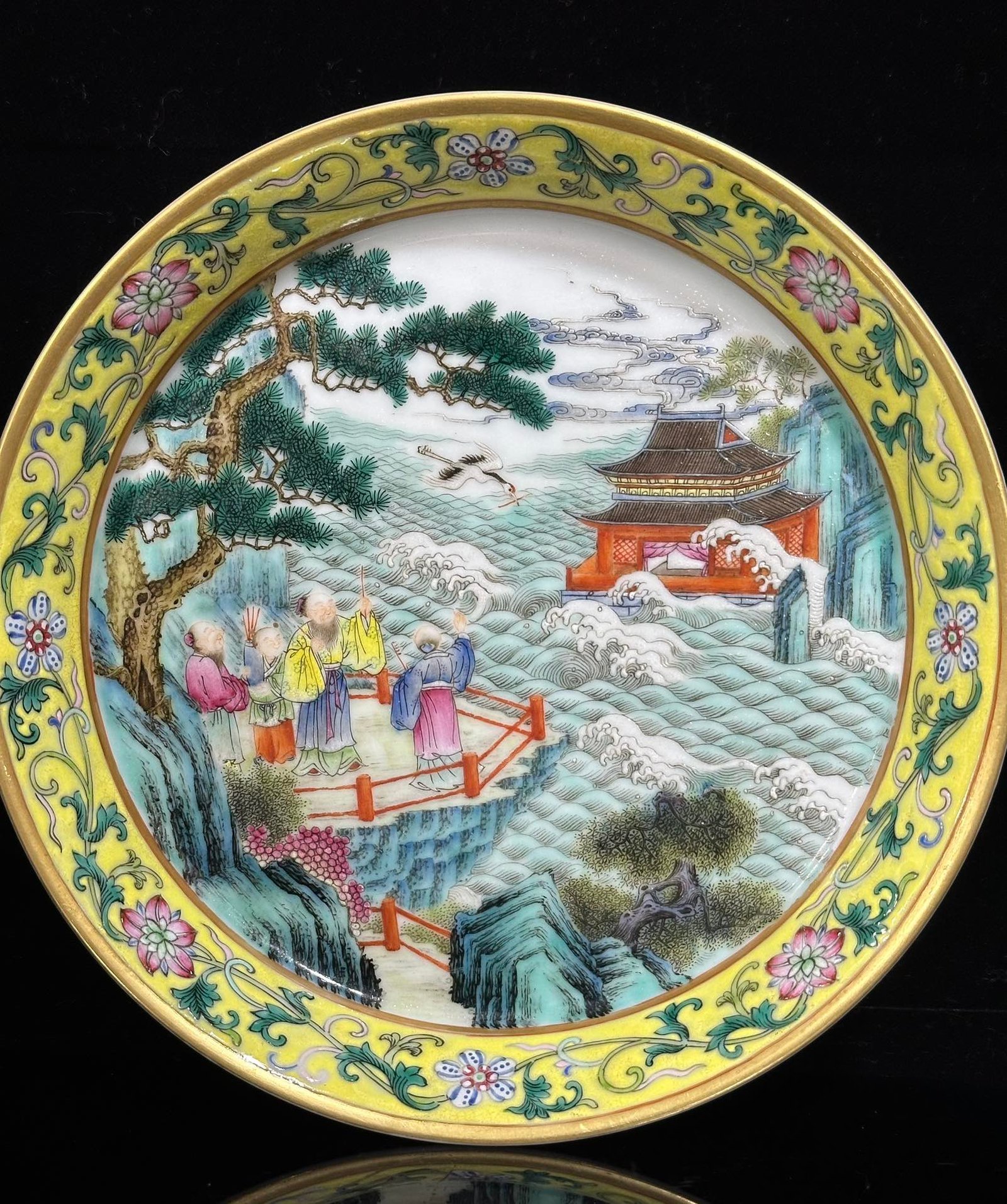 Qing Dynasty Yongzheng pastel yellow ground with flowers and branches character story plate