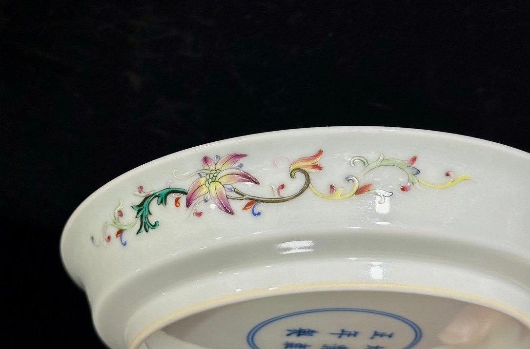 Qing Dynasty Yongzheng pastel yellow ground with flowers and branches character story plate