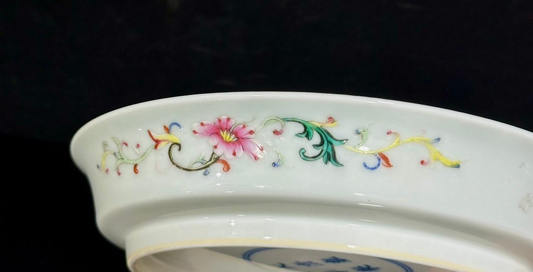 Qing Dynasty Yongzheng pastel yellow ground with flowers and branches character story plate