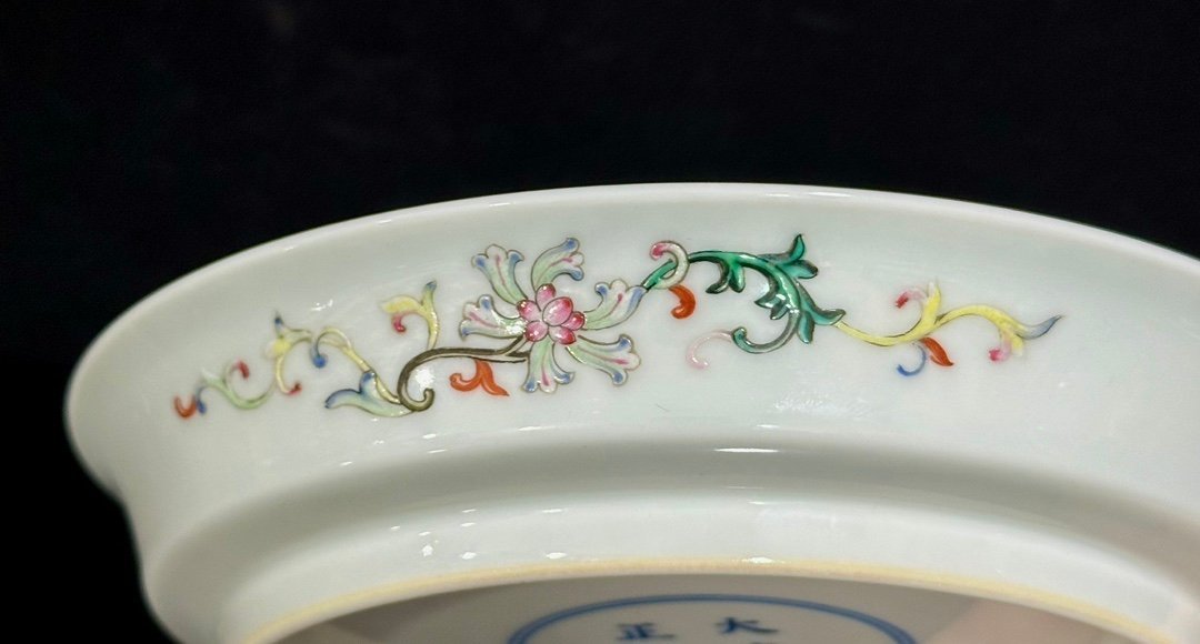 Qing Dynasty Yongzheng pastel yellow ground with flowers and branches character story plate