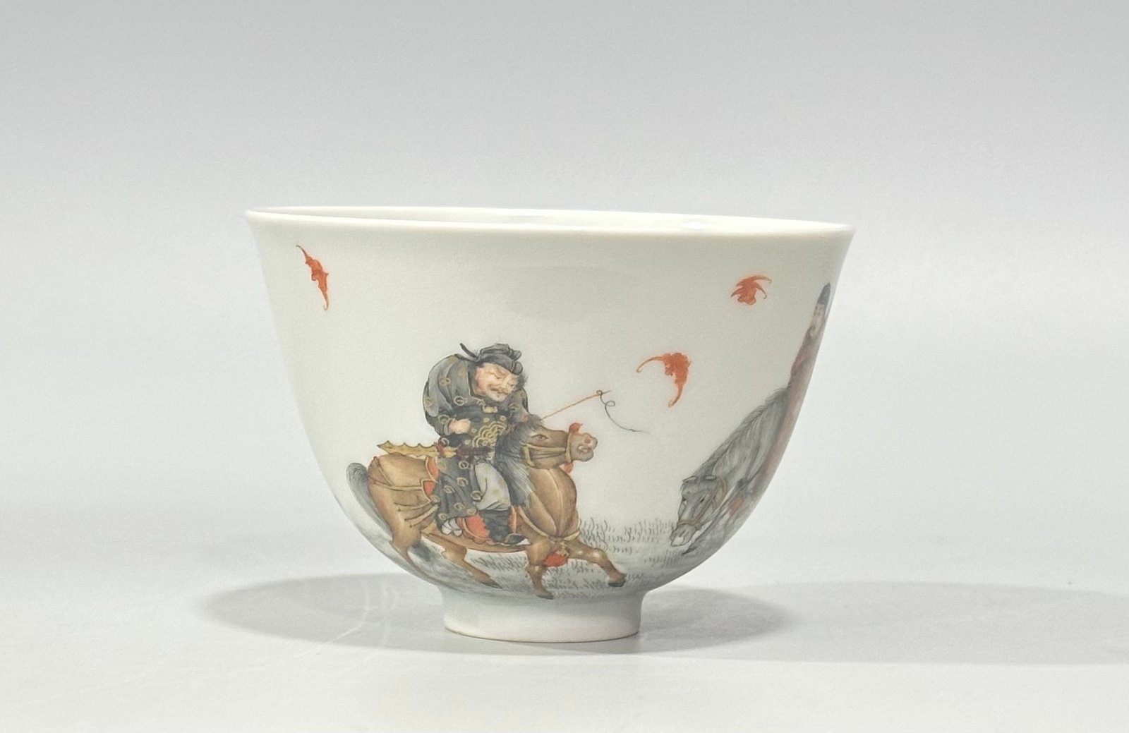 Qing Dynasty Yongzheng Red ink and gold painted figure hunting cup