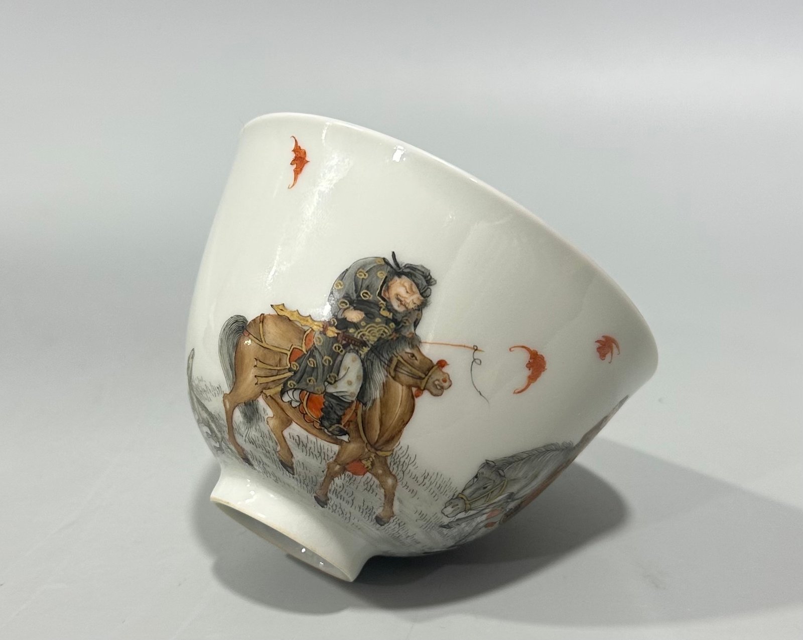 Qing Dynasty Yongzheng Red ink and gold painted figure hunting cup