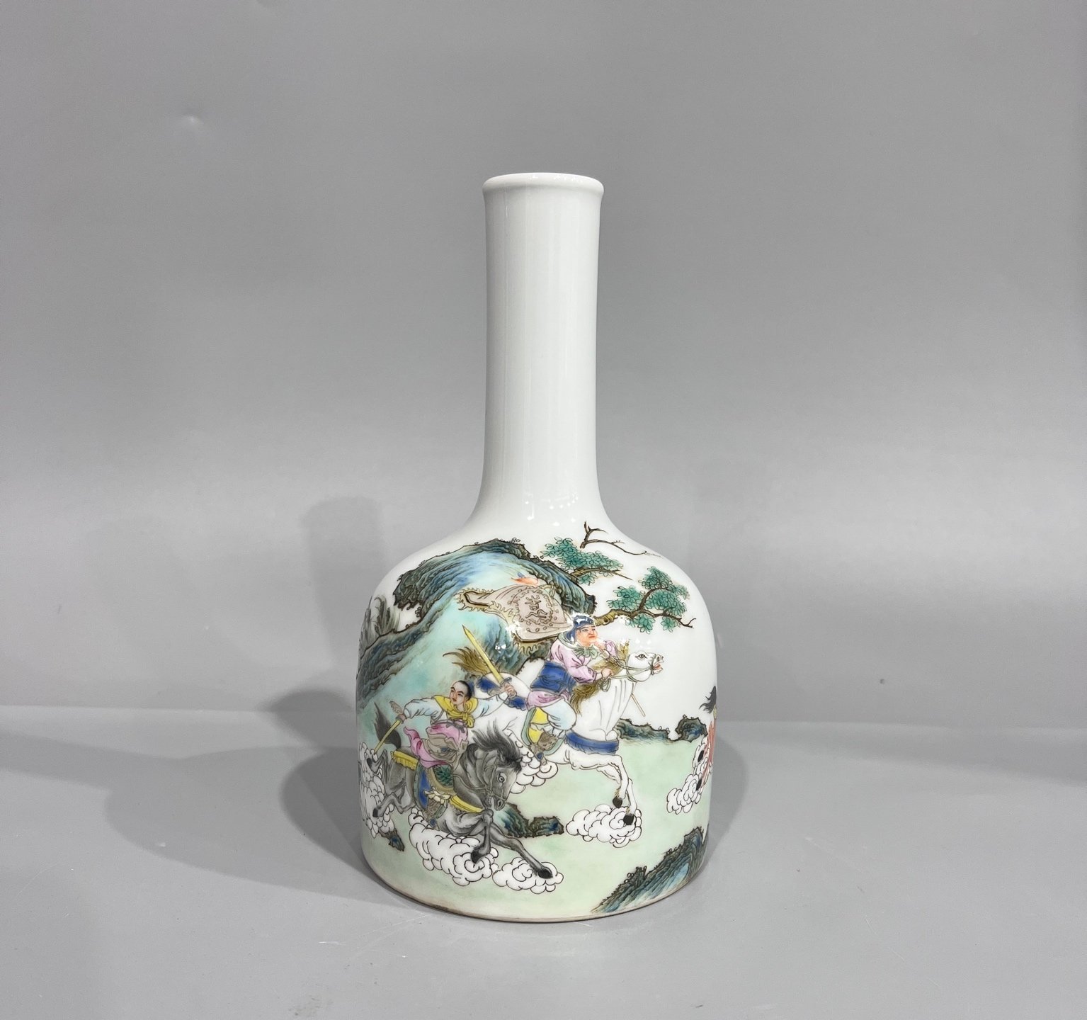 Qing Dynasty Yongzheng pastel colors and the bell-ringing statue