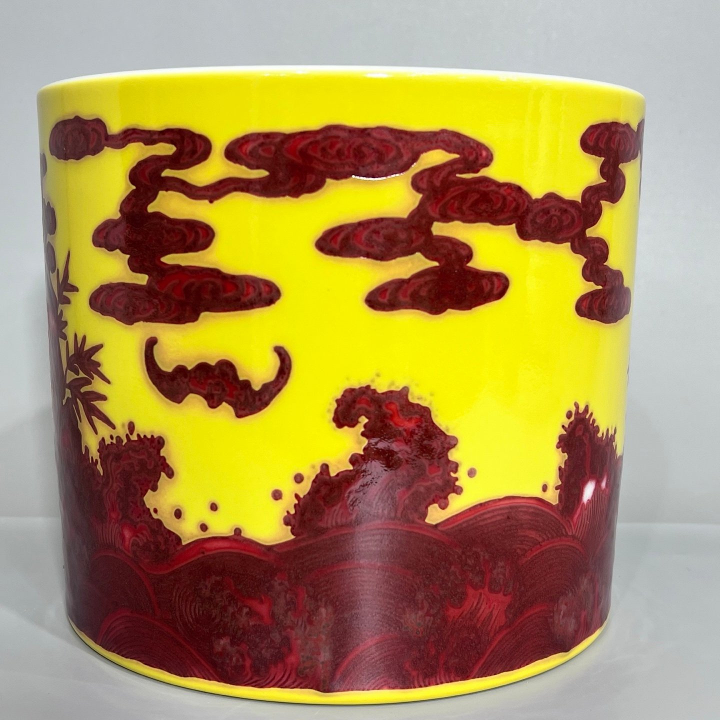 Qing Dynasty Yongzheng plum orchid bamboo and yellow ground and underglaze pen holder