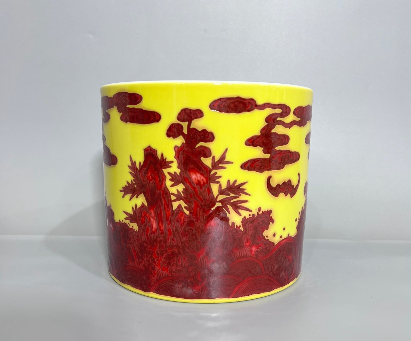 Qing Dynasty Yongzheng plum orchid bamboo and yellow ground and underglaze pen holder