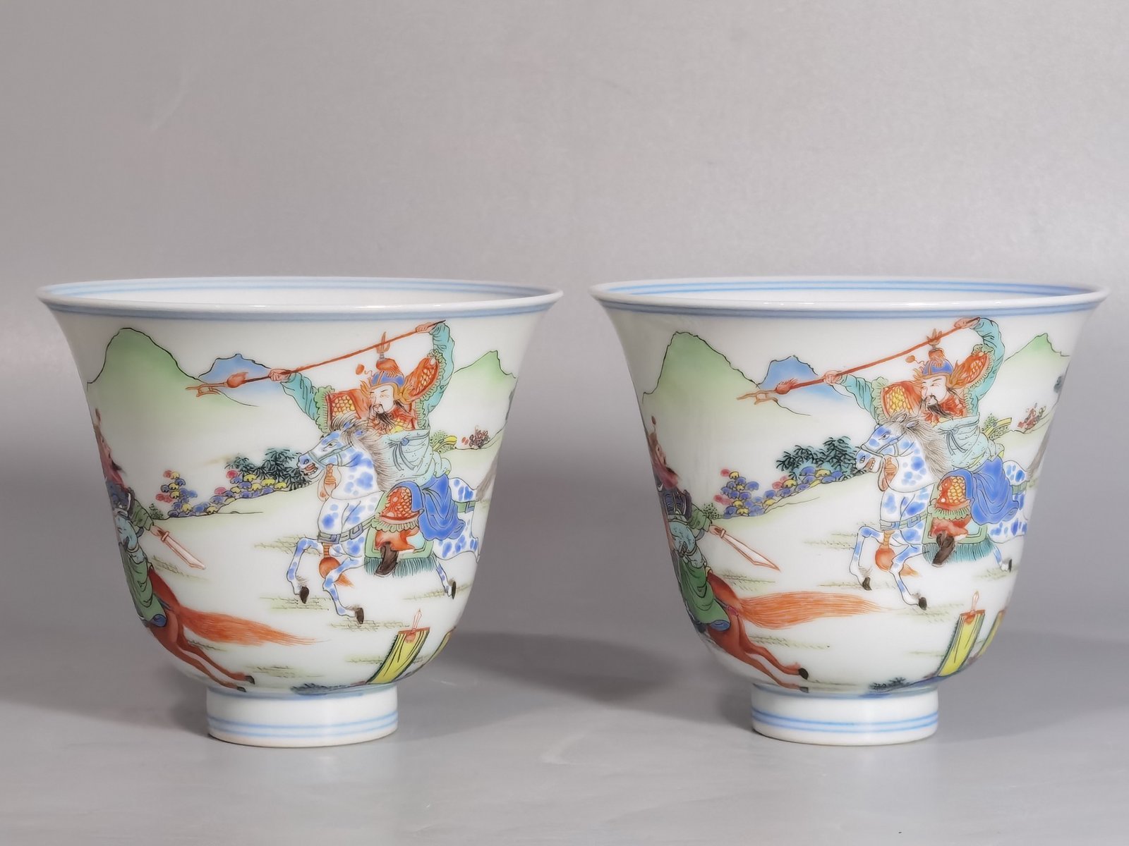 Qing Dynasty Yongzheng a pastel colored saber and horse figure warrior bell cup
